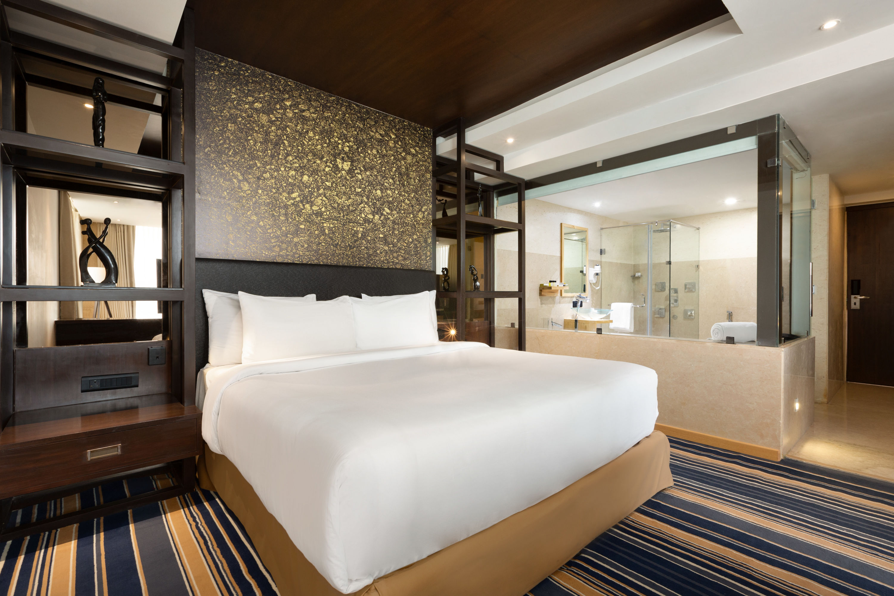 King bed guest room at the Ramada by Wyndham Dehradun Chakrata Road in Dehradun, Other than US/Canada