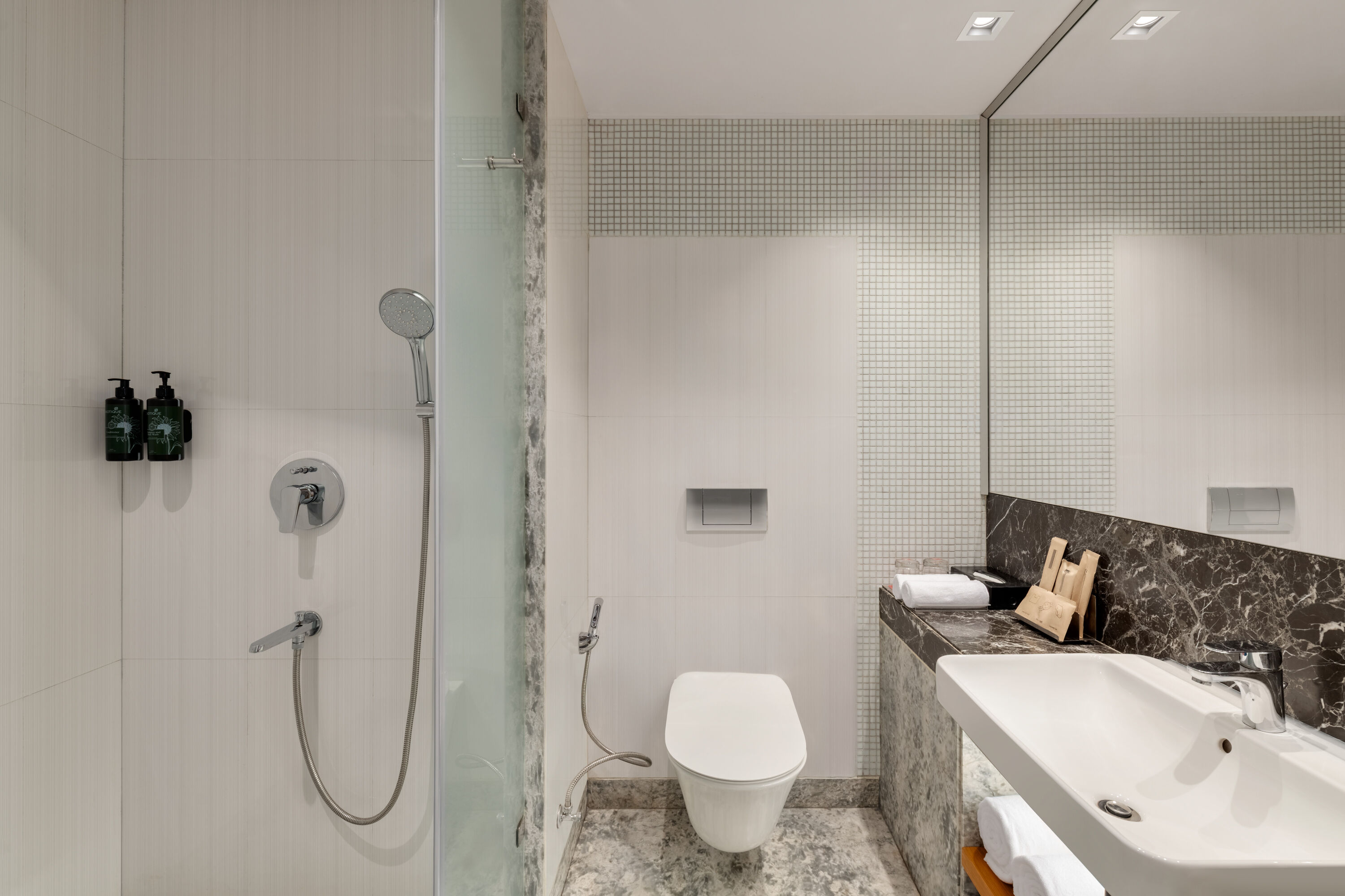 Guest room bath at the Ramada by Wyndham Ghaziabad Vasundhara in Ghaziabad, Other than US/Canada