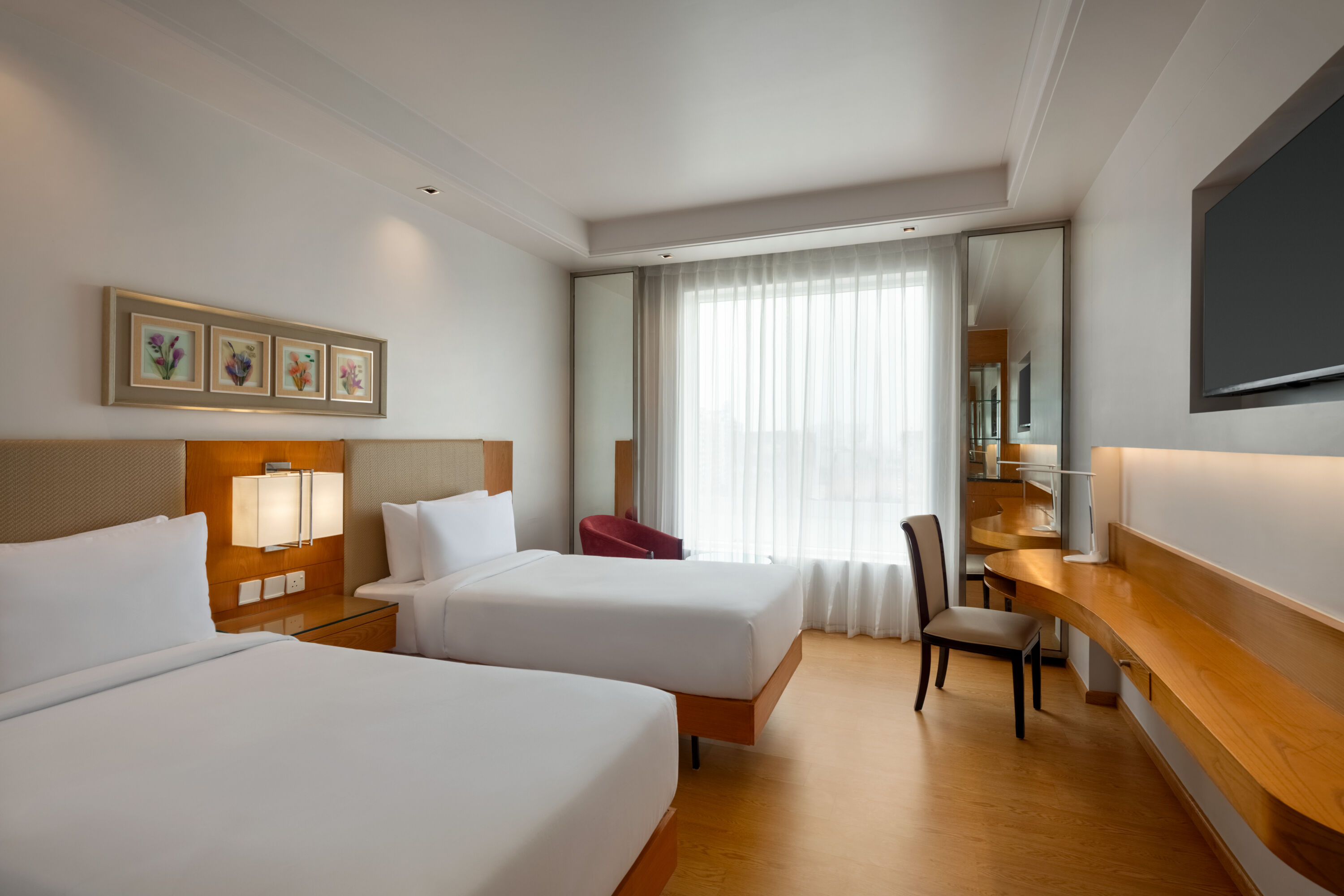 Guest room at the Ramada by Wyndham Ghaziabad Vasundhara in Ghaziabad, Other than US/Canada