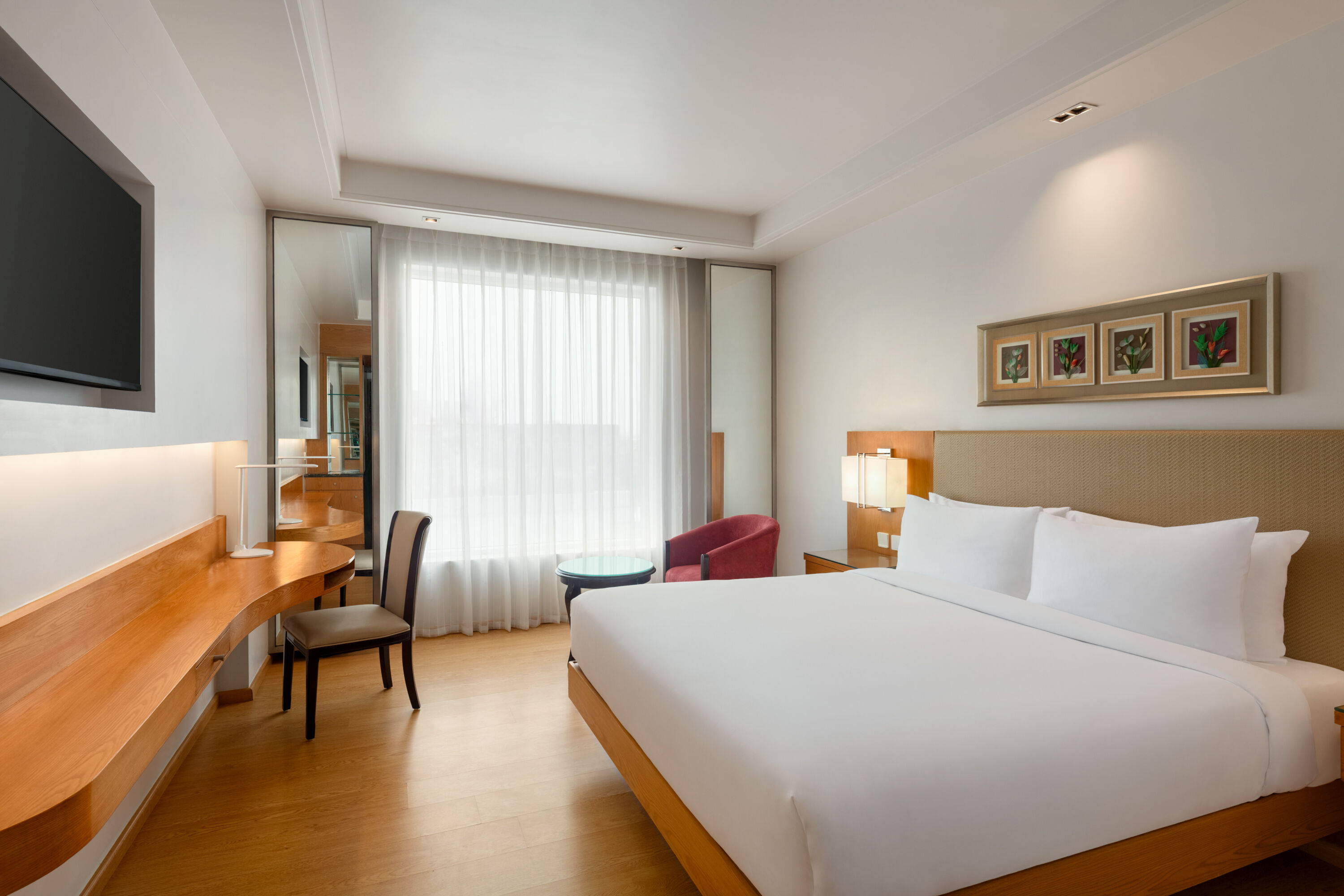 Guest room at the Ramada by Wyndham Ghaziabad Vasundhara in Ghaziabad, Other than US/Canada