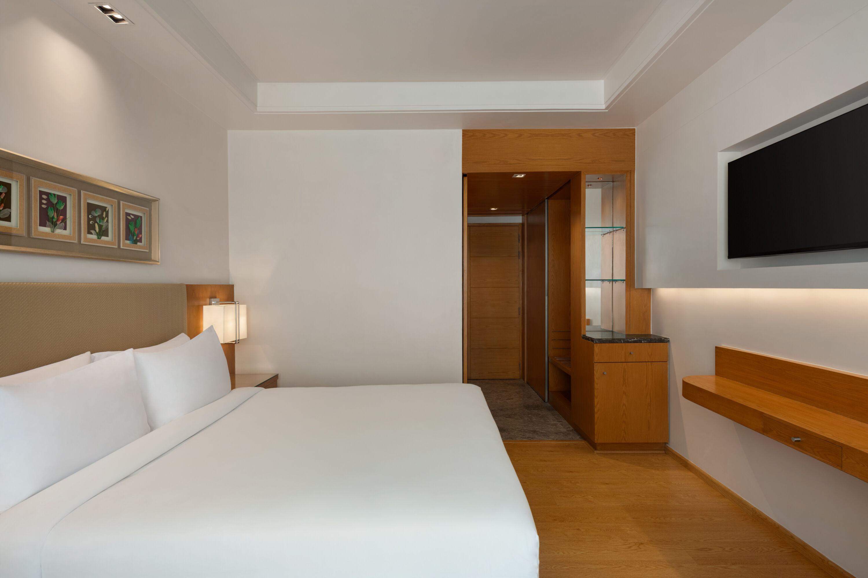 Guest room at the Ramada by Wyndham Ghaziabad Vasundhara in Ghaziabad, Other than US/Canada