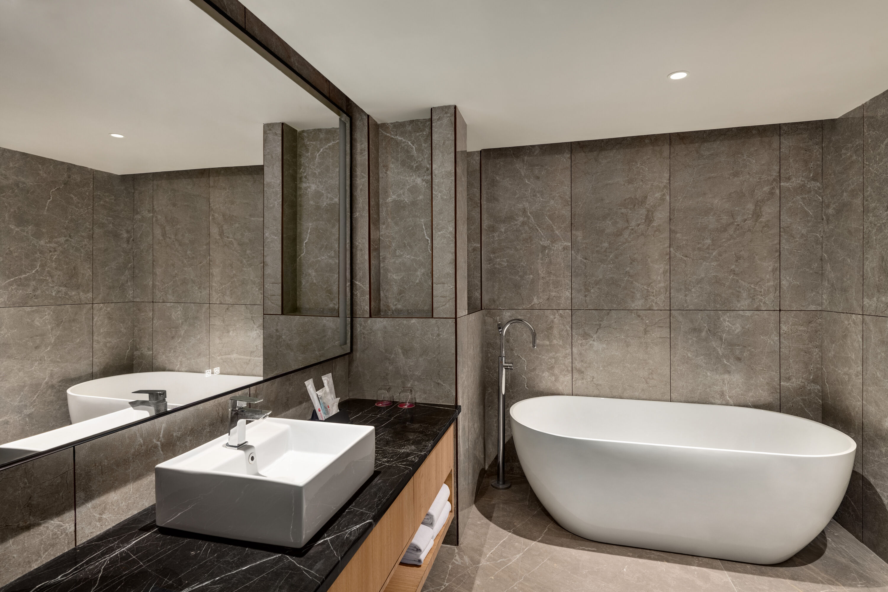 Guest room bath at the Ramada Encore by Wyndham Gurugram Dwarka Expressway in Gurugram, Other than US/Canada