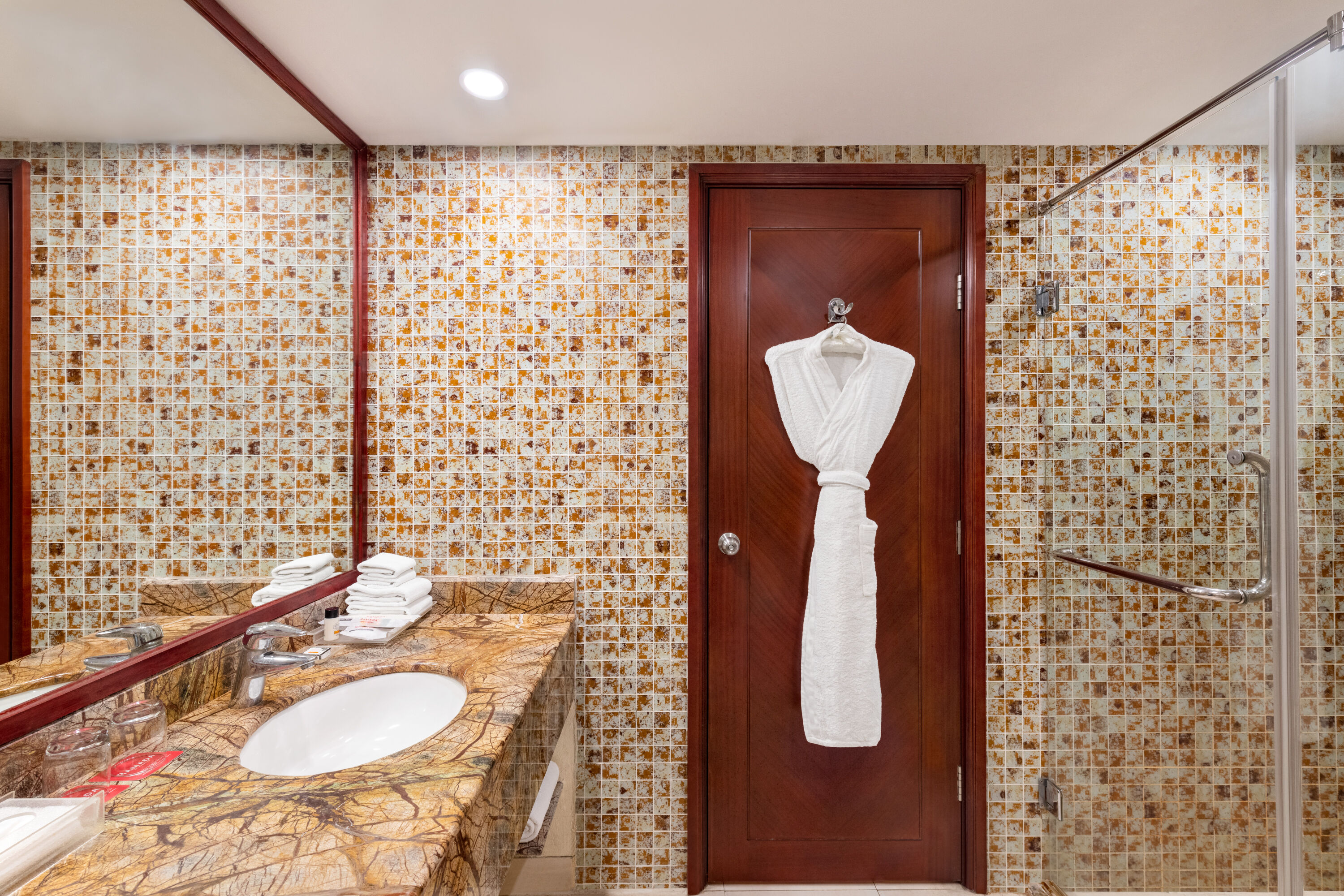 Guest room bath at the Ramada by Wyndham Jaipur Jaisinghpura in Jaipur, Other than US/Canada