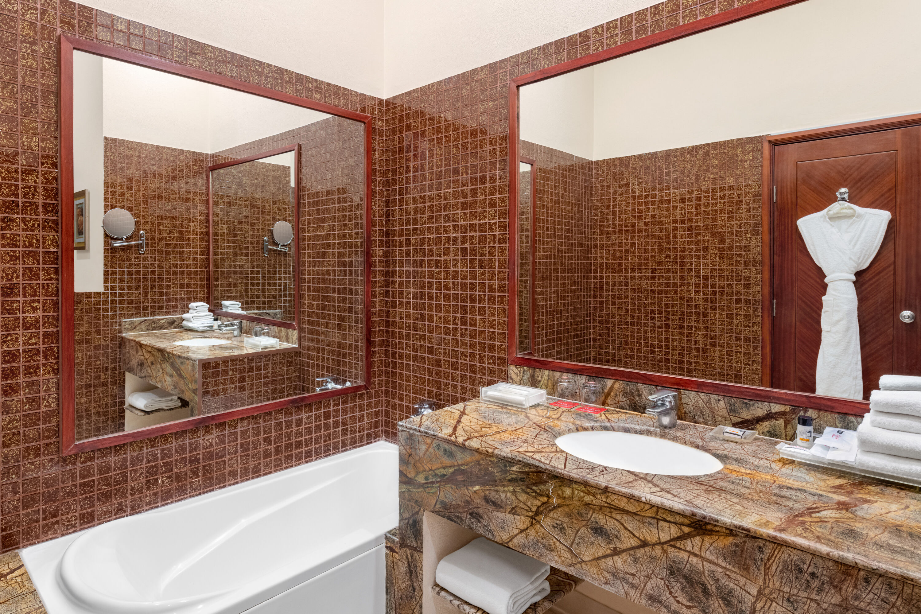 Guest room bath at the Ramada by Wyndham Jaipur Jaisinghpura in Jaipur, Other than US/Canada