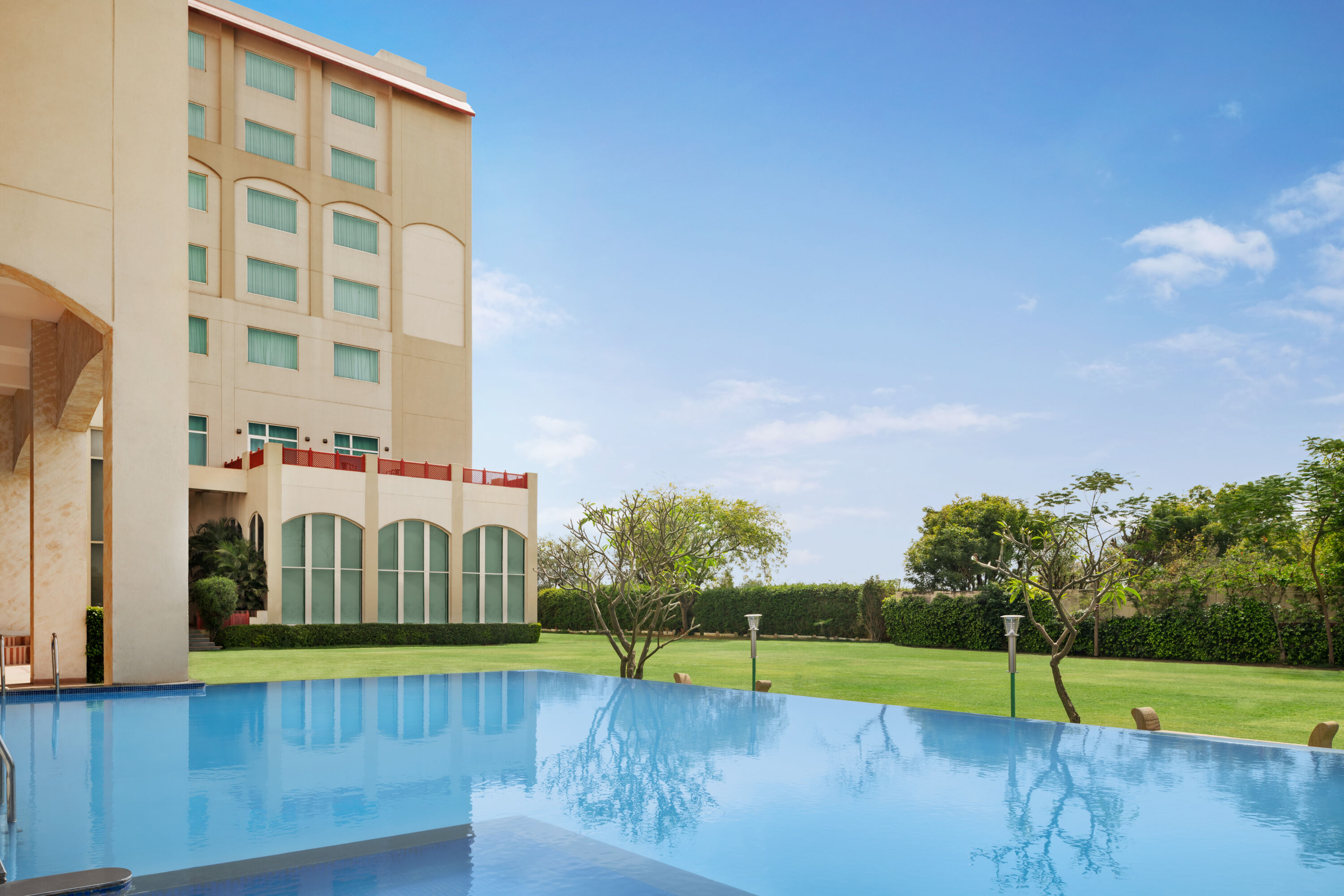 Family pool at the Ramada by Wyndham Jaipur Jaisinghpura in Jaipur, Other than US/Canada