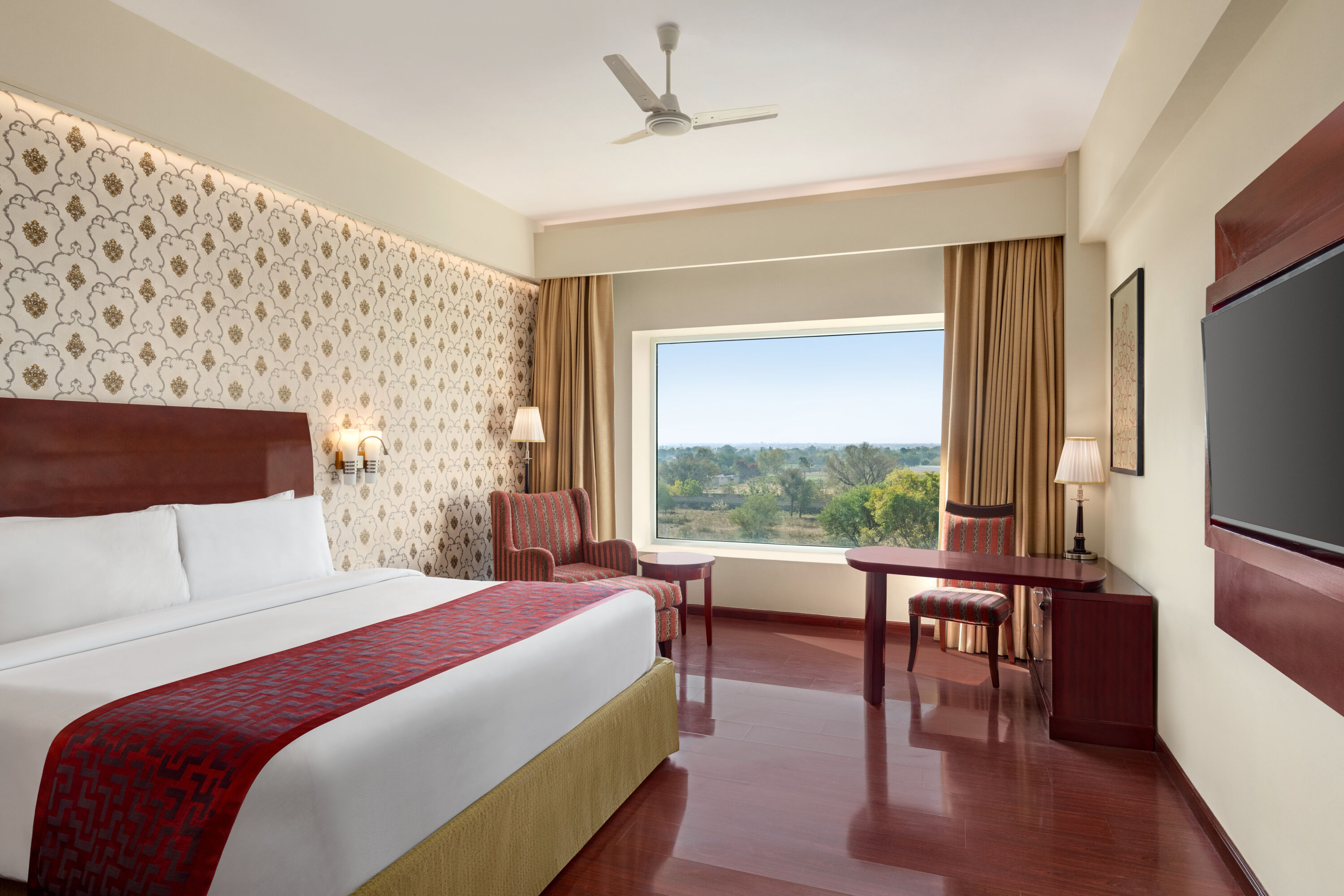 Guest room at the Ramada by Wyndham Jaipur Jaisinghpura in Jaipur, Other than US/Canada