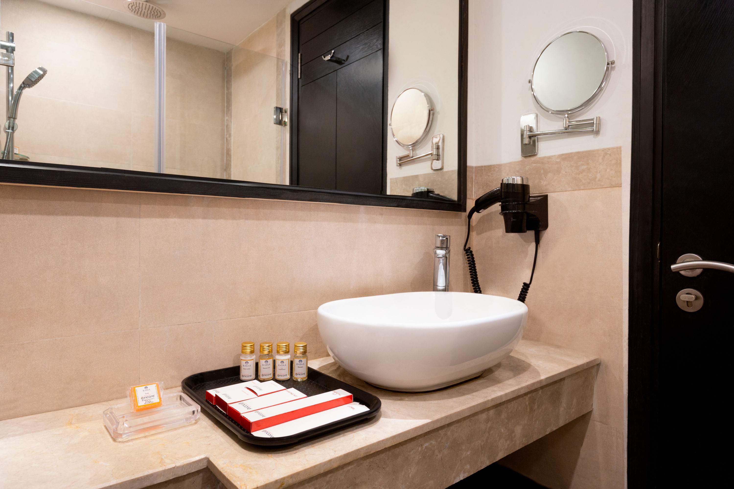 Guest room bath at the Ramada Encore by Wyndham Jalandhar in Jalandhar, Other than US/Canada