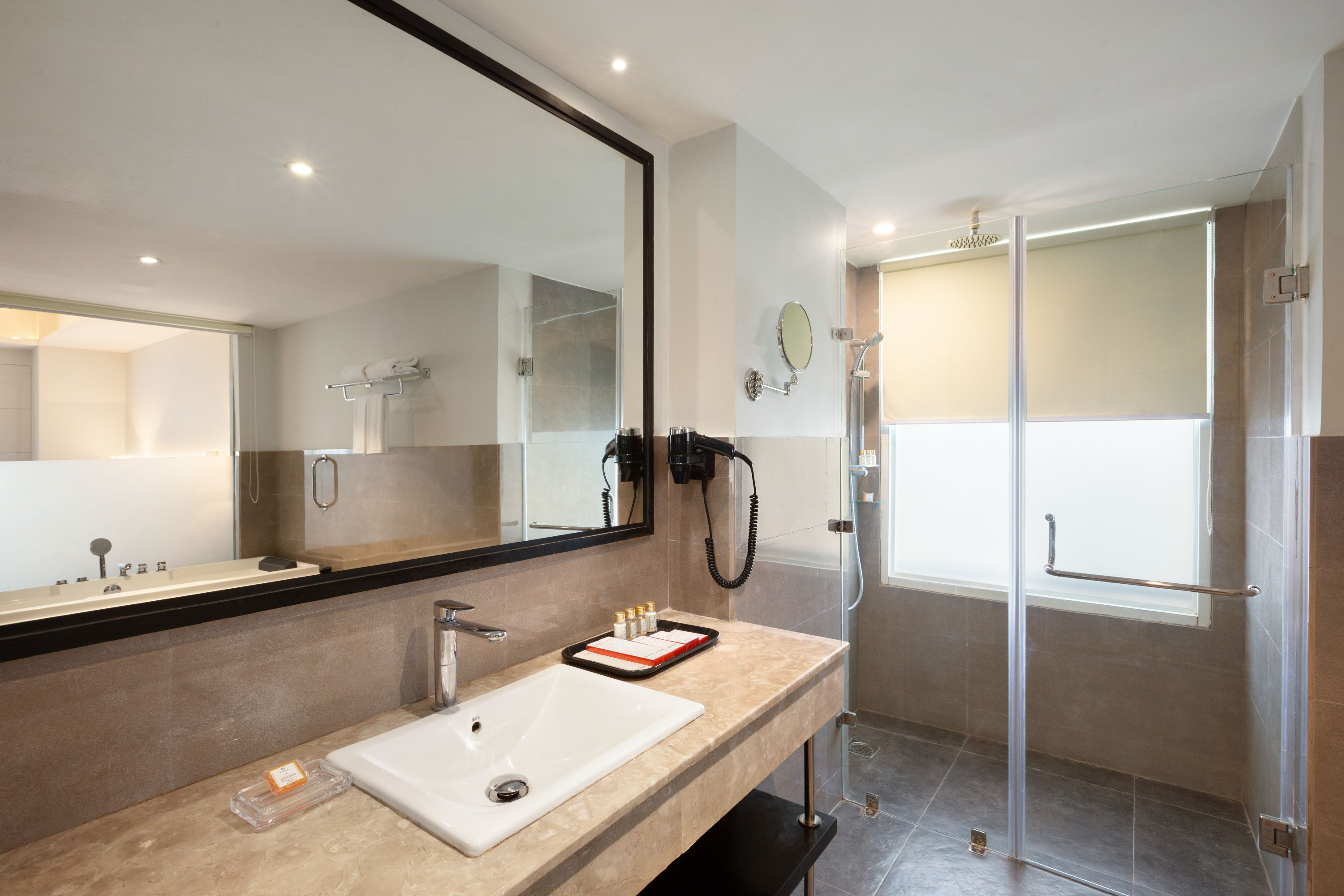 Guest room bath at the Ramada Encore by Wyndham Jalandhar in Jalandhar, Other than US/Canada