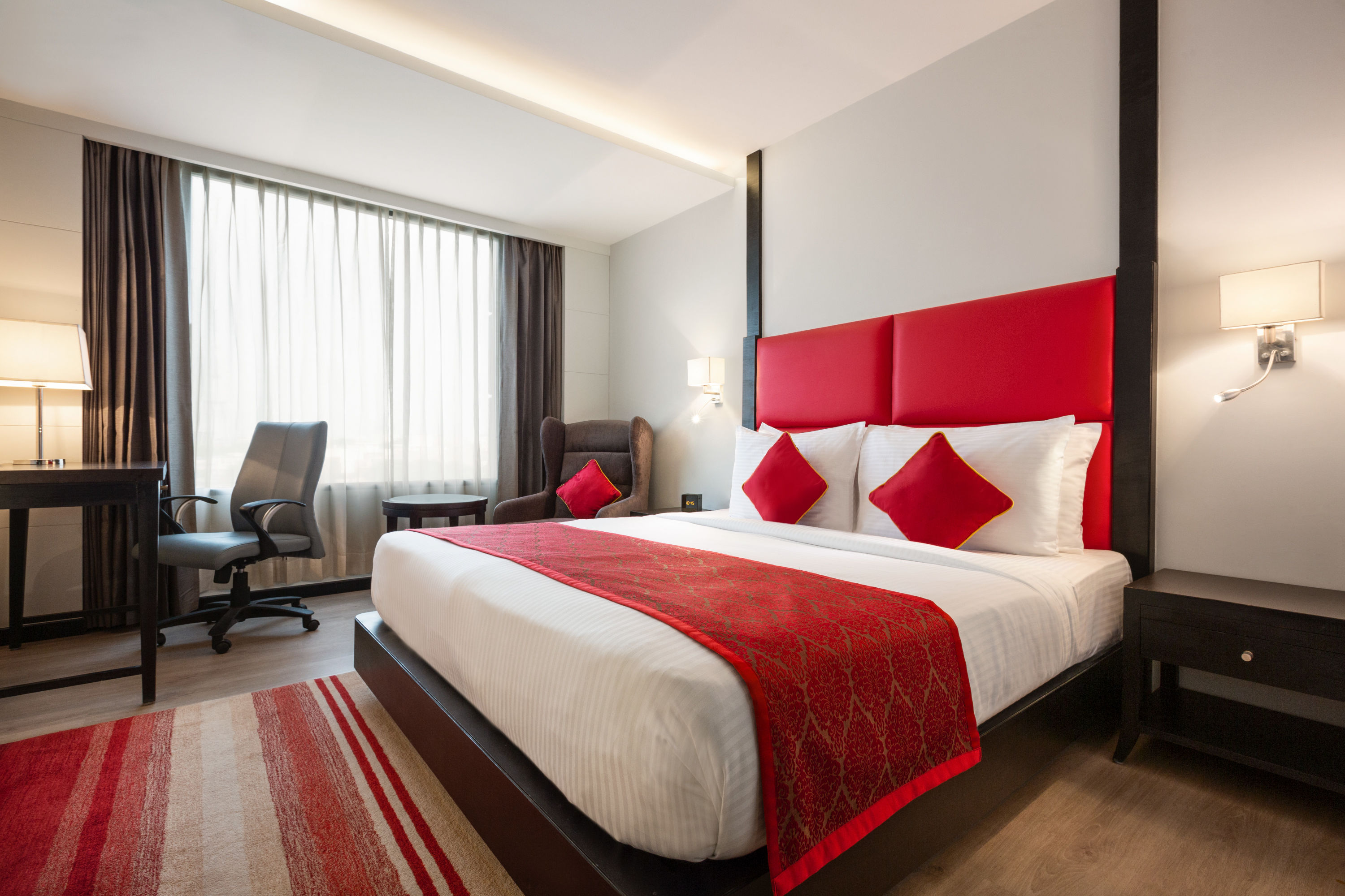 Guest room at the Ramada Encore by Wyndham Jalandhar in Jalandhar, Other than US/Canada