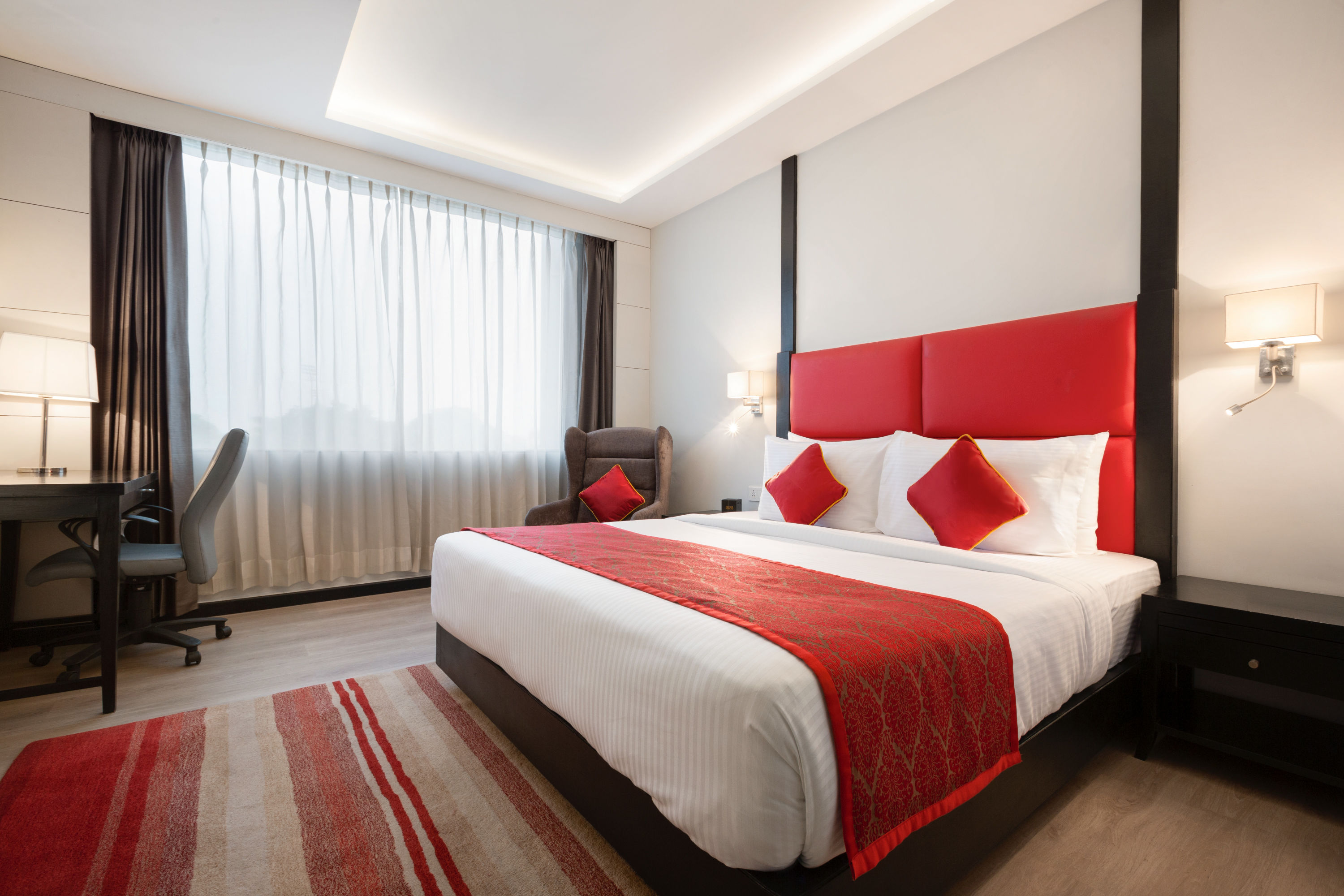 Guest room at the Ramada Encore by Wyndham Jalandhar in Jalandhar, Other than US/Canada