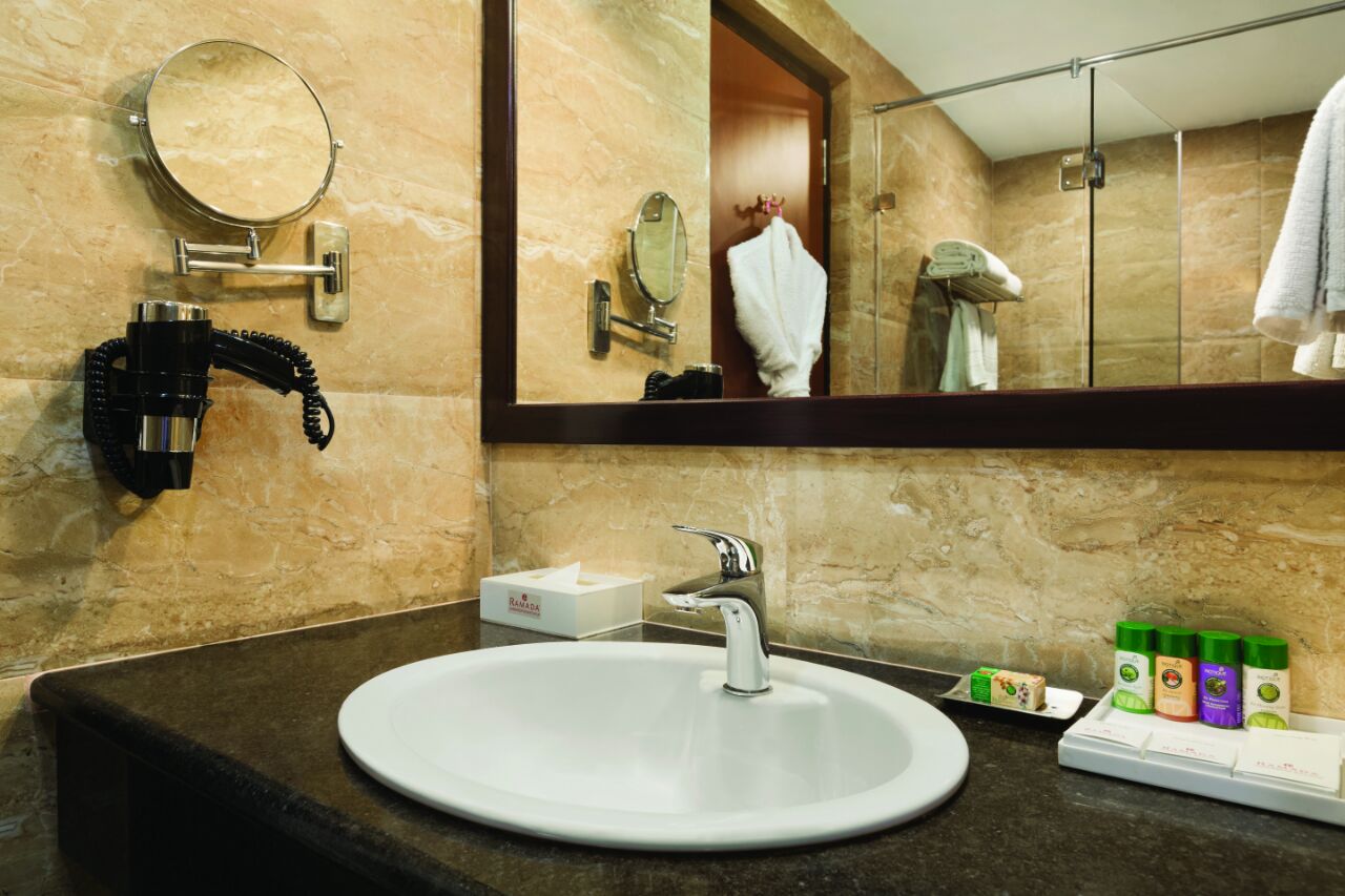 Guest room at the Ramada by Wyndham Jamshedpur in Jamshedpur, Other than US/Canada