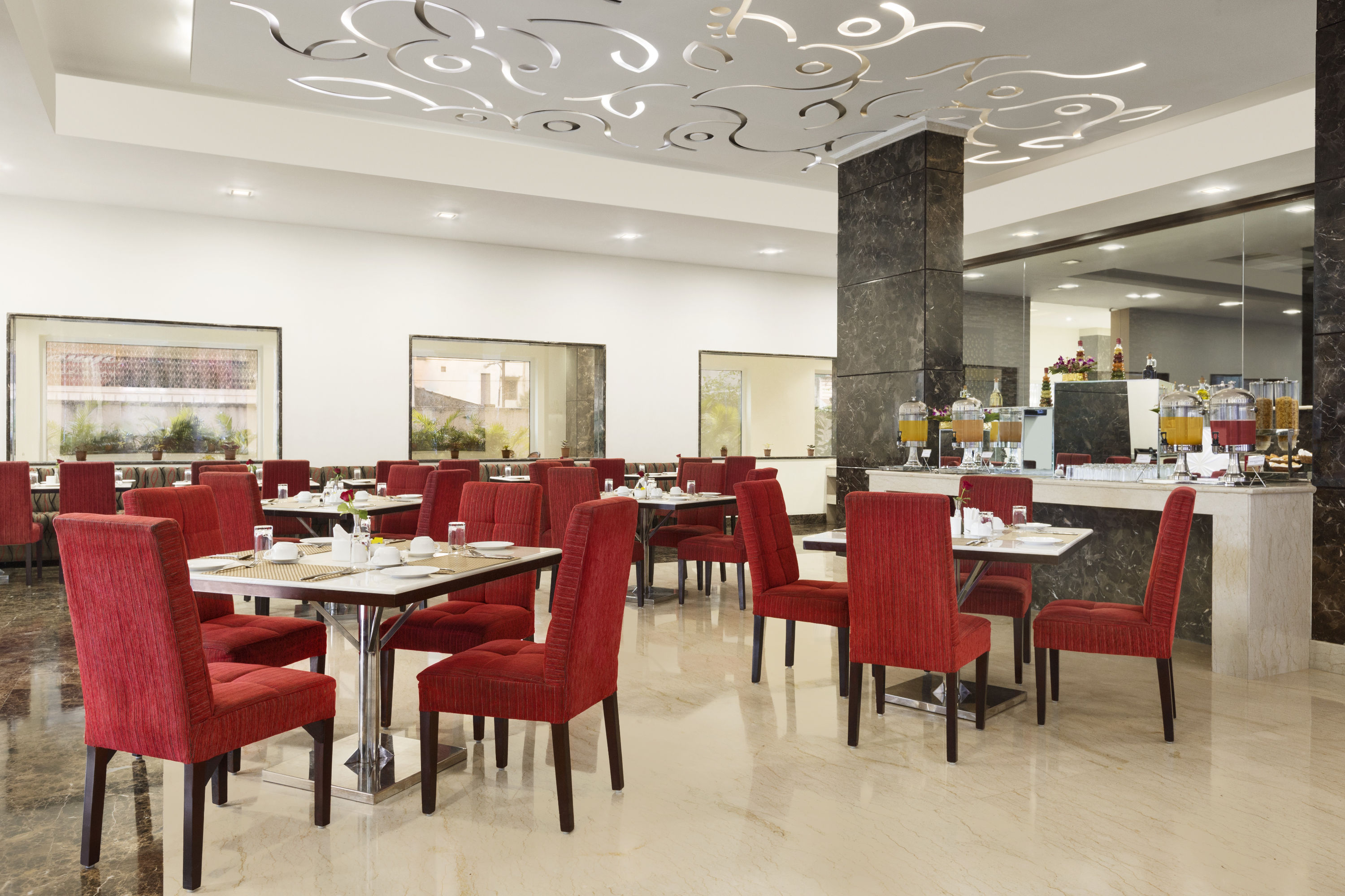 Ramada by Wyndham Jamshedpur restaurant breakfast area with seating in Jamshedpur, Other than US/Canada