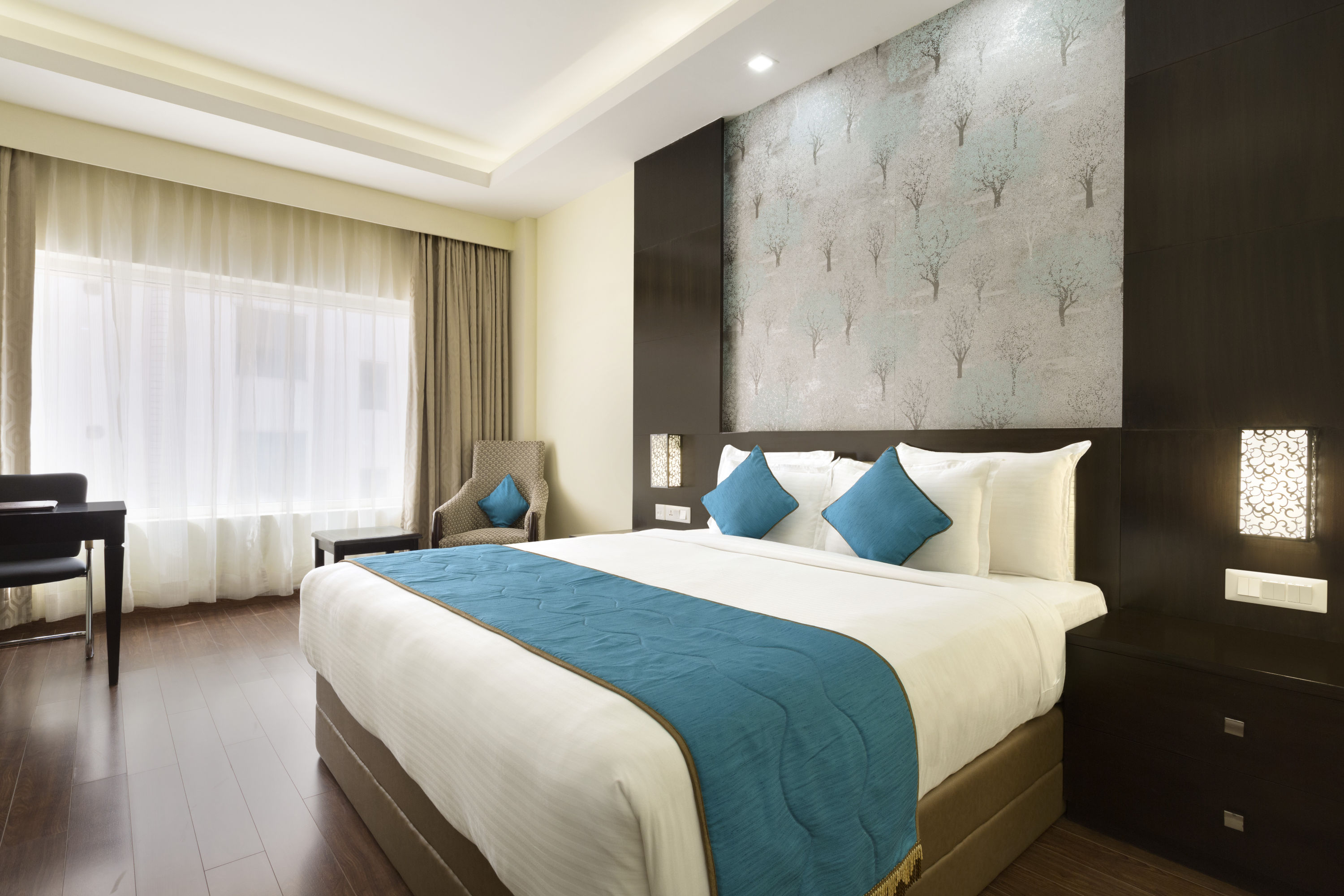 Guest room at the Ramada by Wyndham Jamshedpur in Jamshedpur, Other than US/Canada