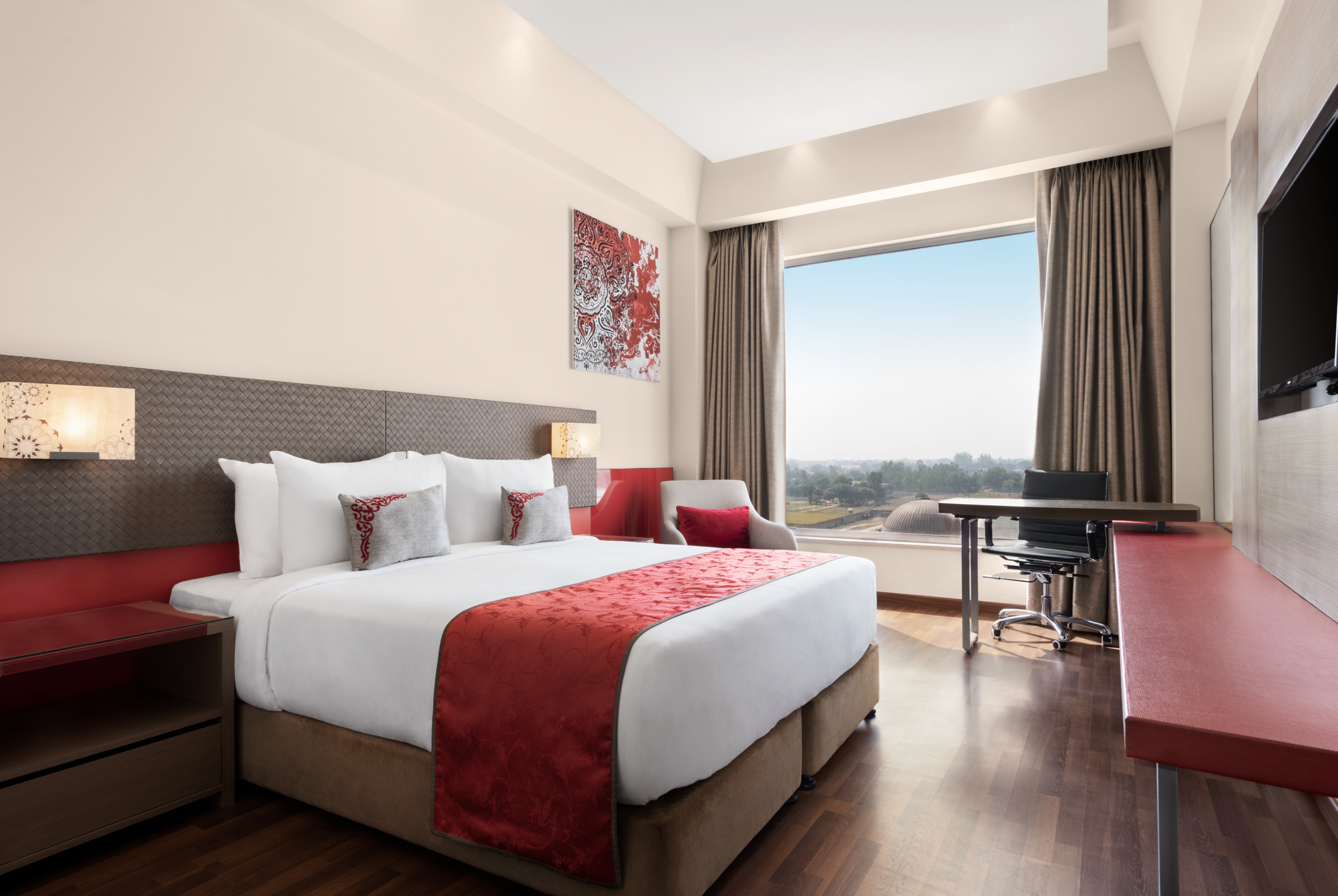 Guest room at the Ramada by Wyndham Lucknow Hotel and Convention Center in Lucknow, Other than US/Canada