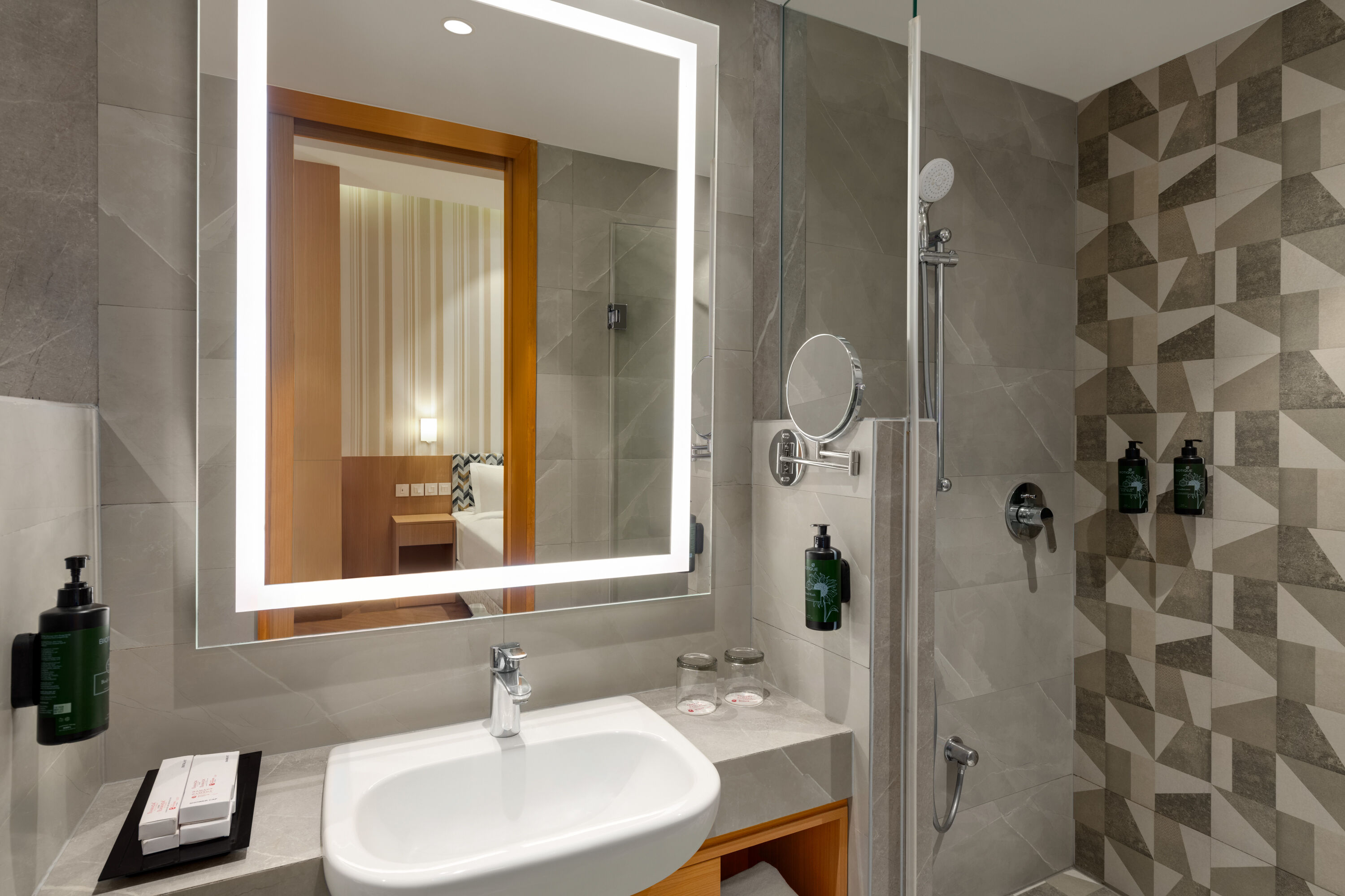 Guest room bath at the Ramada Encore by Wyndham Lucknow Airport in Lucknow, Other than US/Canada