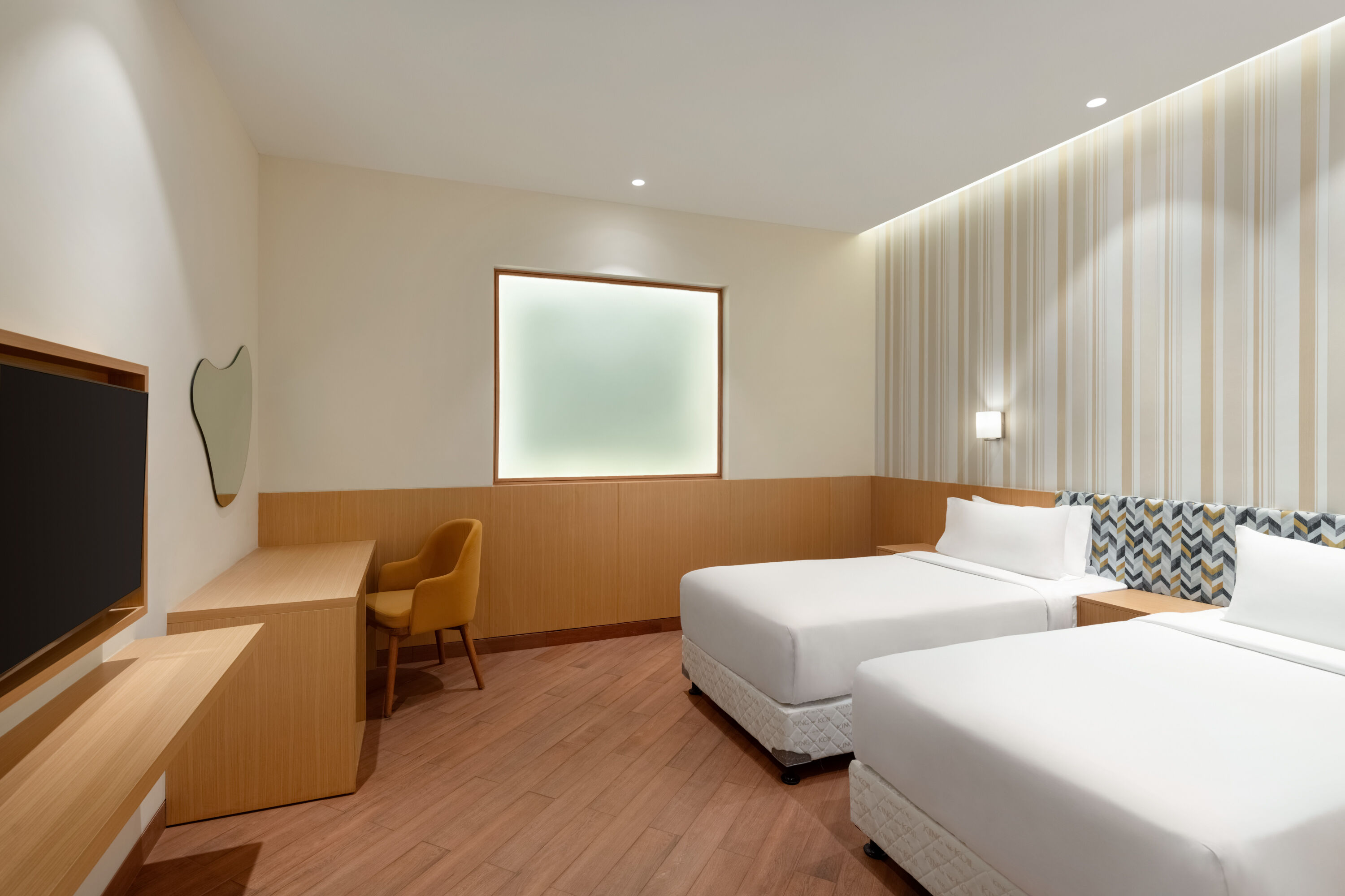 Guest room at the Ramada Encore by Wyndham Lucknow Airport in Lucknow, Other than US/Canada