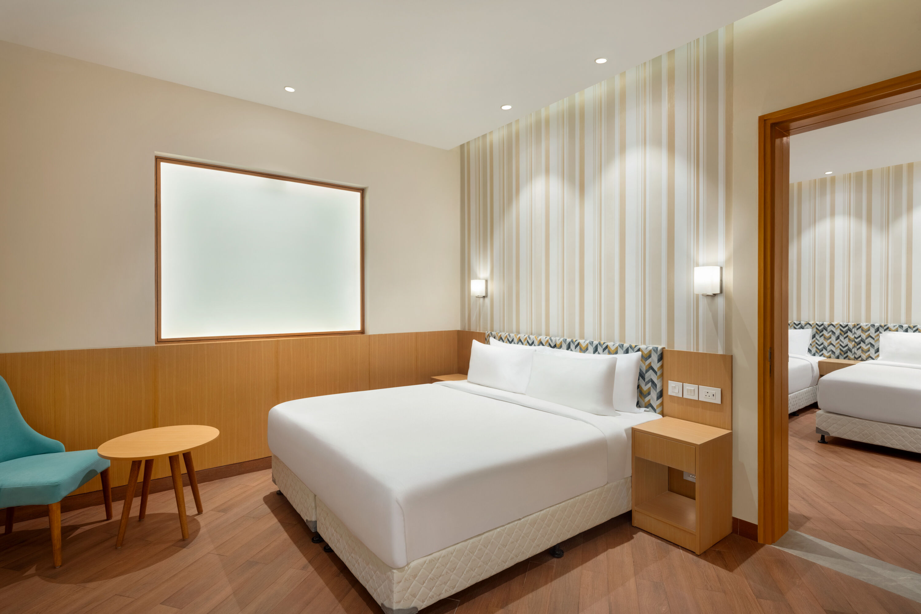 Guest room at the Ramada Encore by Wyndham Lucknow Airport in Lucknow, Other than US/Canada