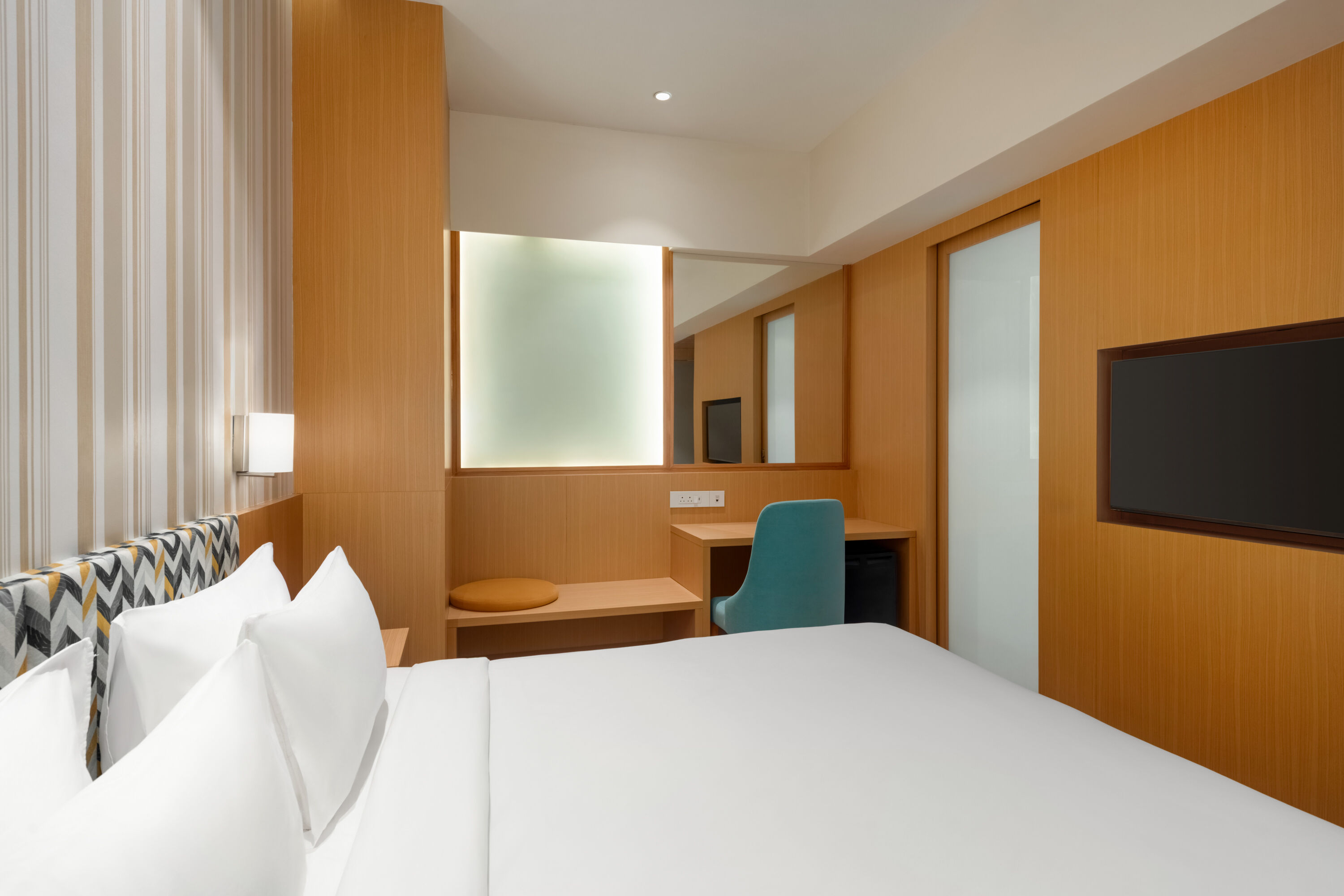 Guest room at the Ramada Encore by Wyndham Lucknow Airport in Lucknow, Other than US/Canada