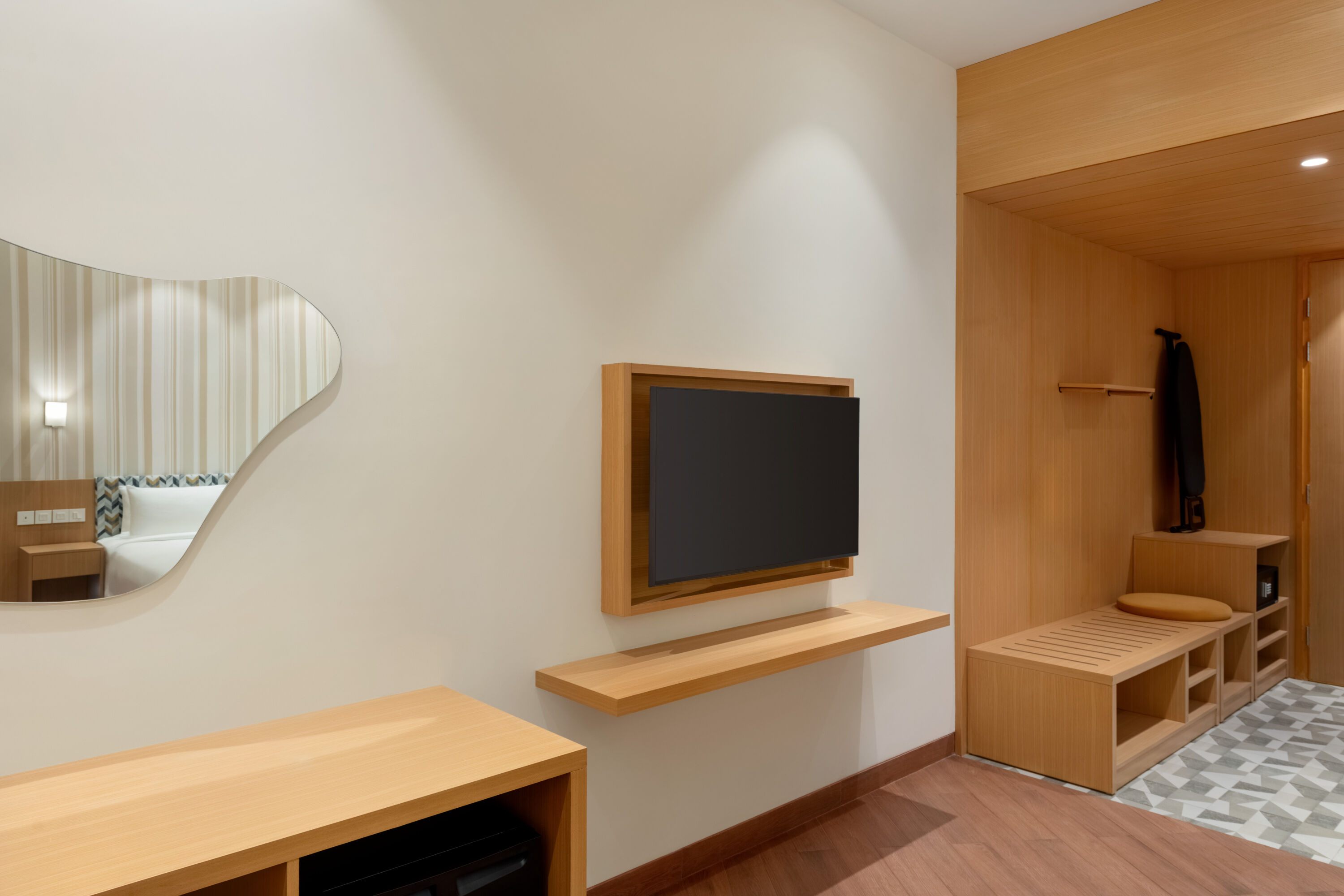 Guest room at the Ramada Encore by Wyndham Lucknow Airport in Lucknow, Other than US/Canada