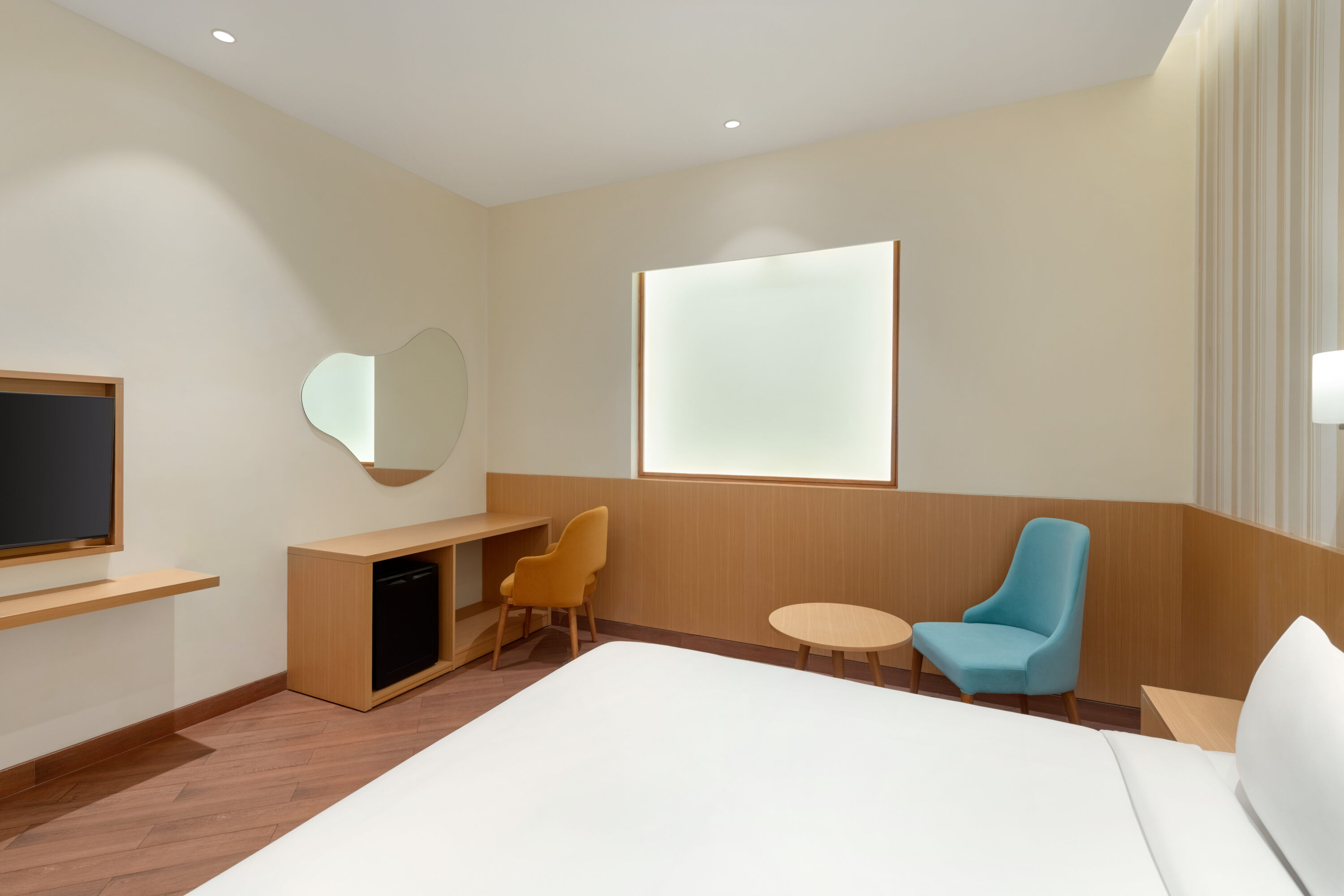 Guest room at the Ramada Encore by Wyndham Lucknow Airport in Lucknow, Other than US/Canada