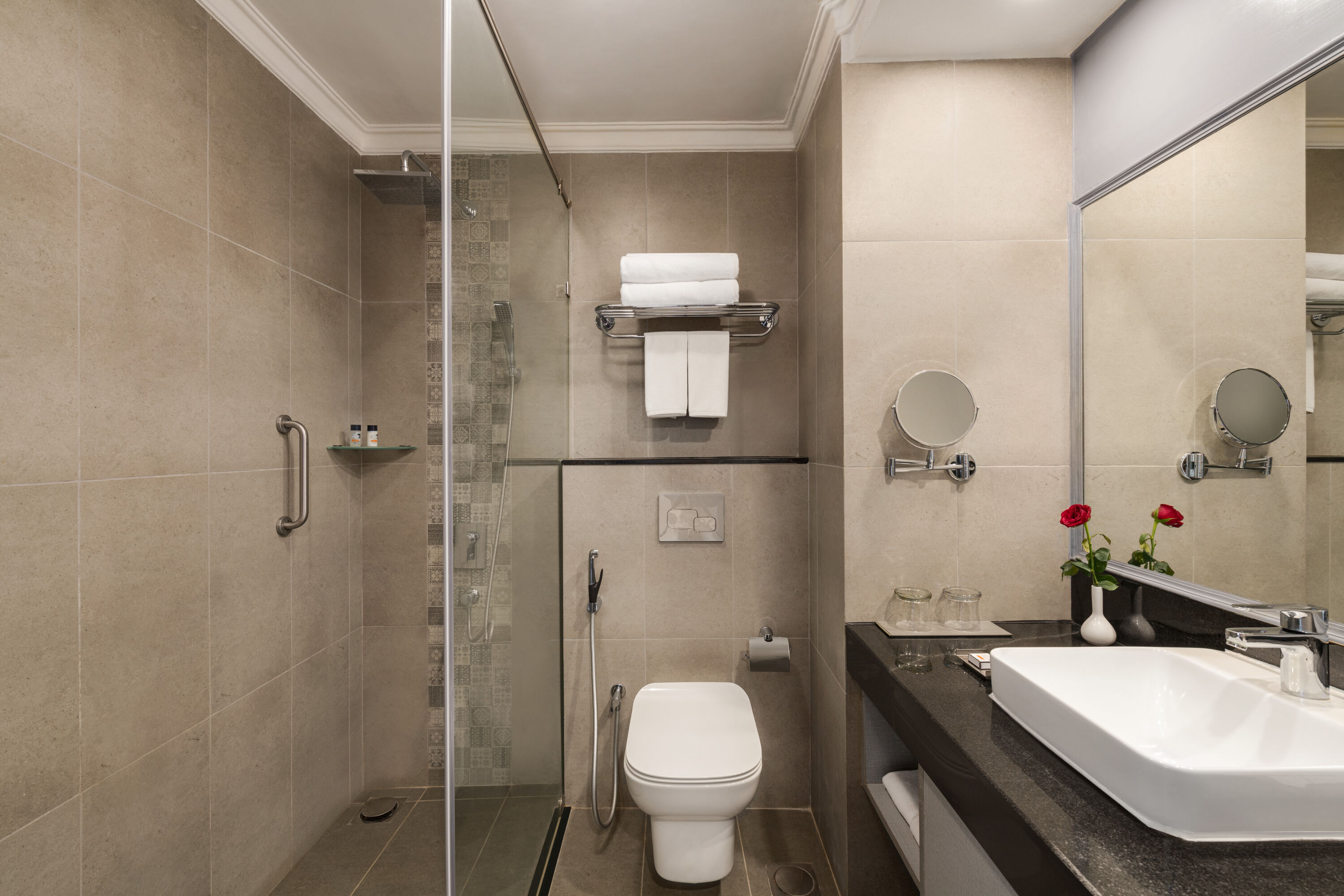 Guest room bath at the Ramada By Wyndham Mussoorie Mall Road in Mussoorie, Other than US/Canada