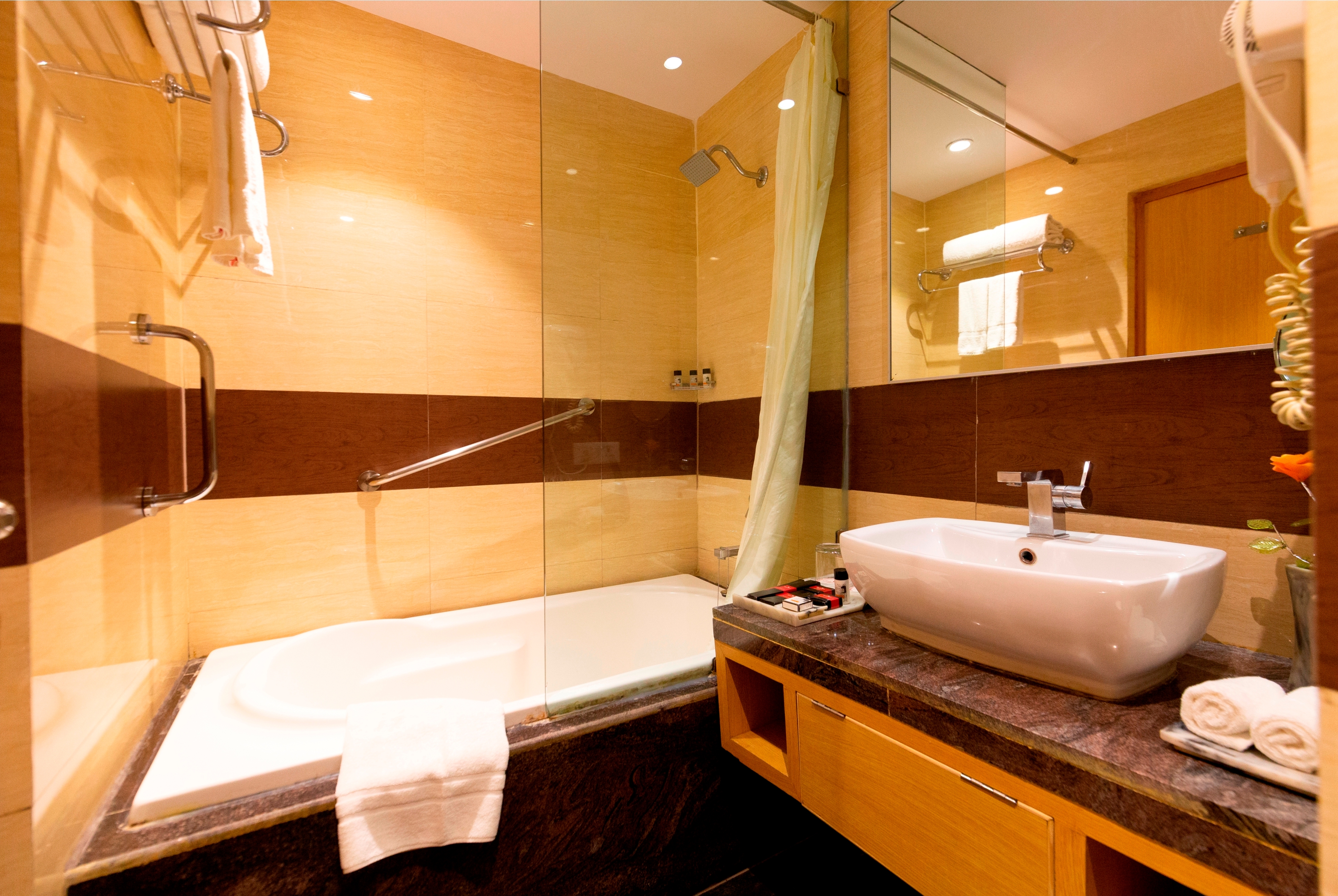 Guest room bath at the Ramada by Wyndham Neemrana in Shahjahanpur, Other than US/Canada