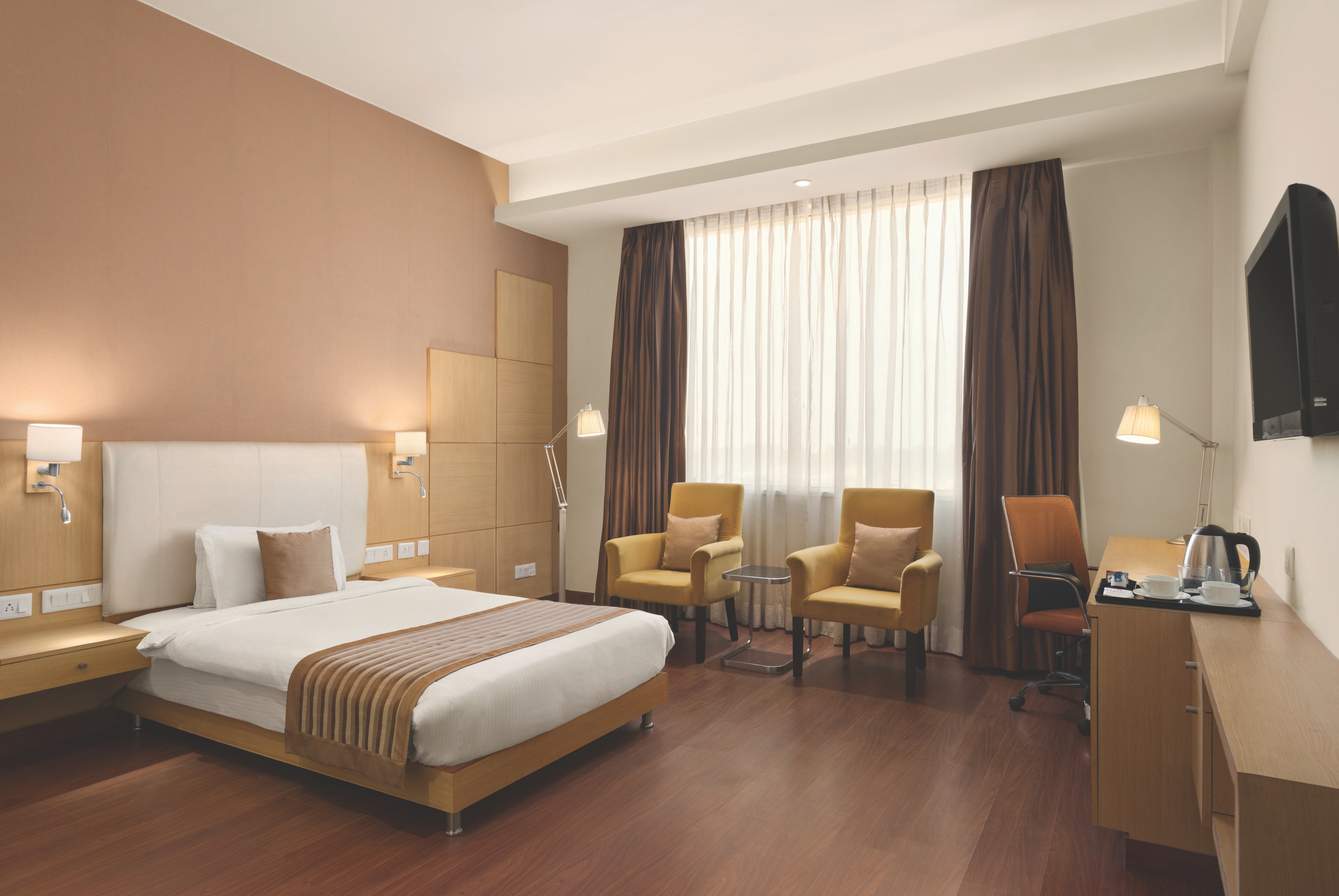 Guest room at the Ramada by Wyndham Neemrana in Shahjahanpur, Other than US/Canada