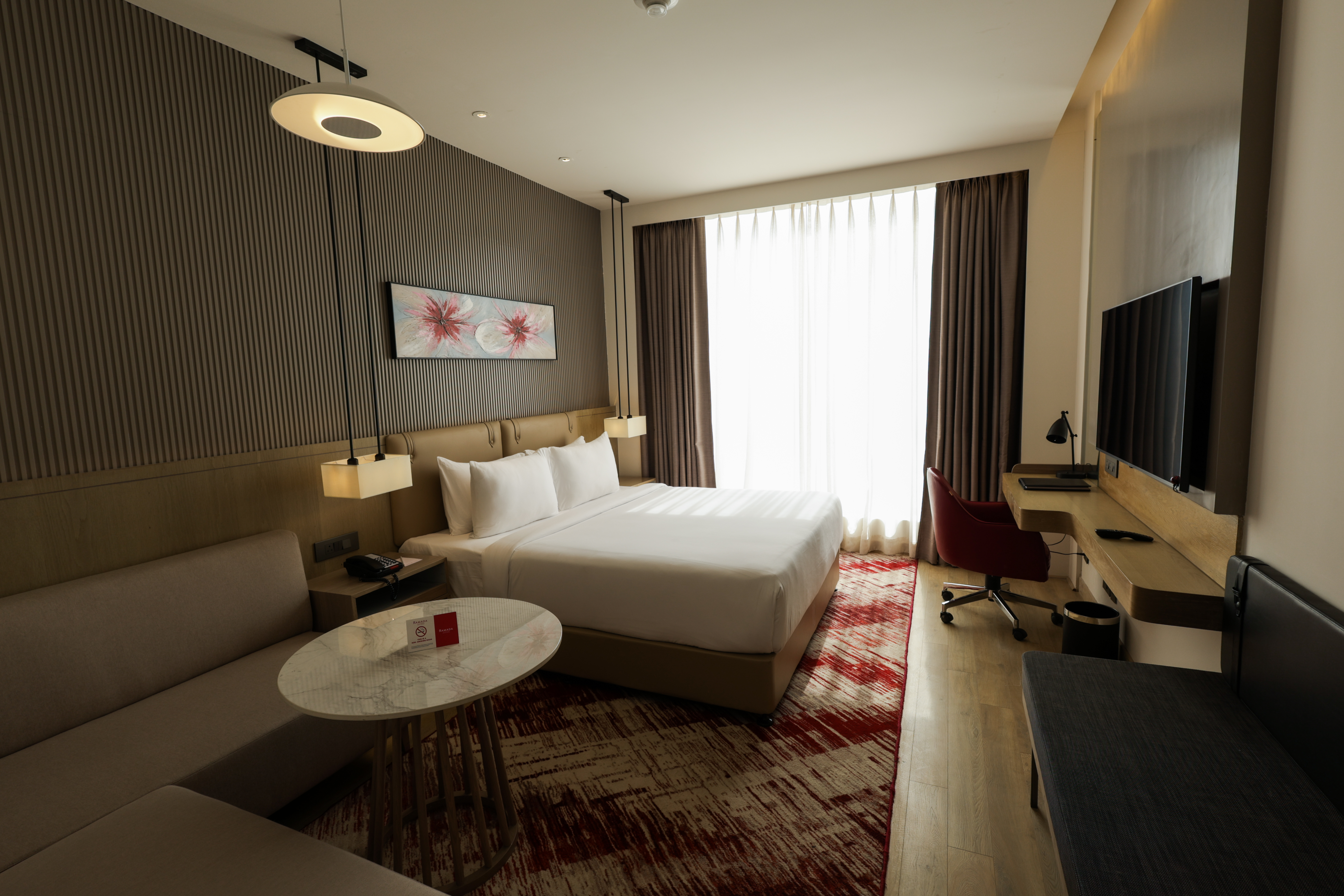 Guest room at the Ramada by Wyndham Sonipat Murthal in Sonipat, Other than US/Canada