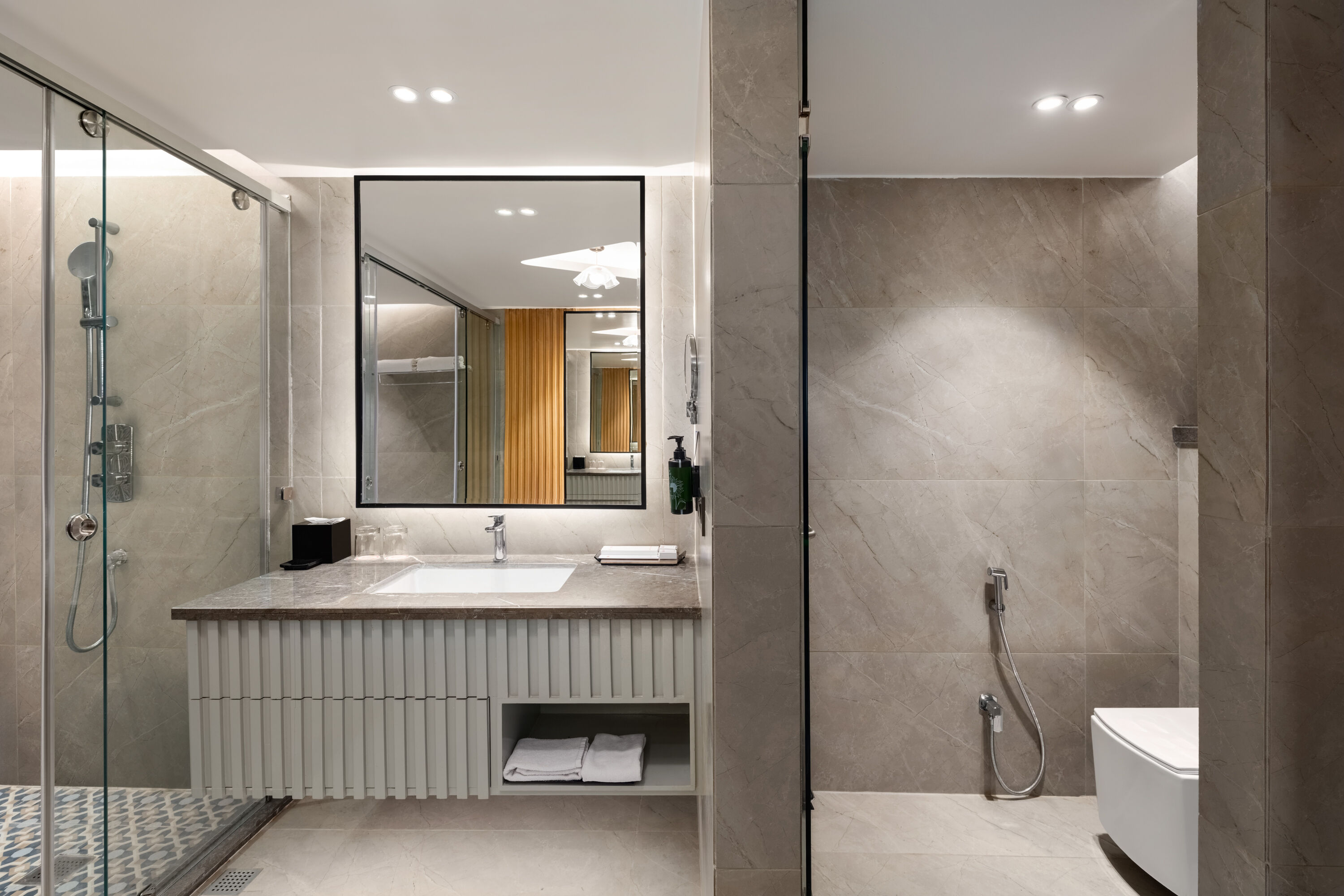 Guest room bath at the Ramada Encore by Wyndham Rajbagh Srinagar in Srinagar, Other than US/Canada