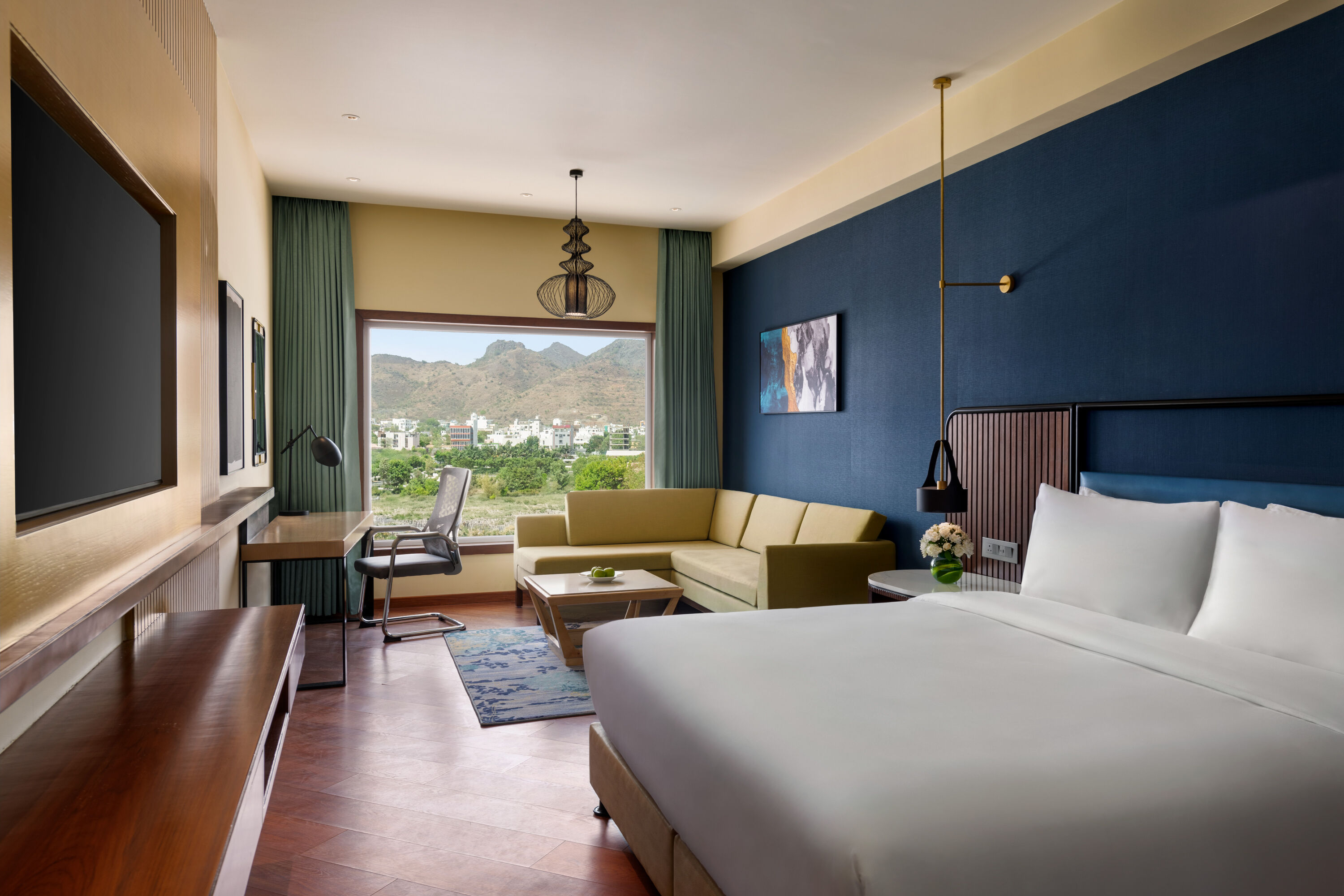 Guest room at the Ramada Encore by Wyndham Udaipur Roopnagar in Udaipur, Other than US/Canada