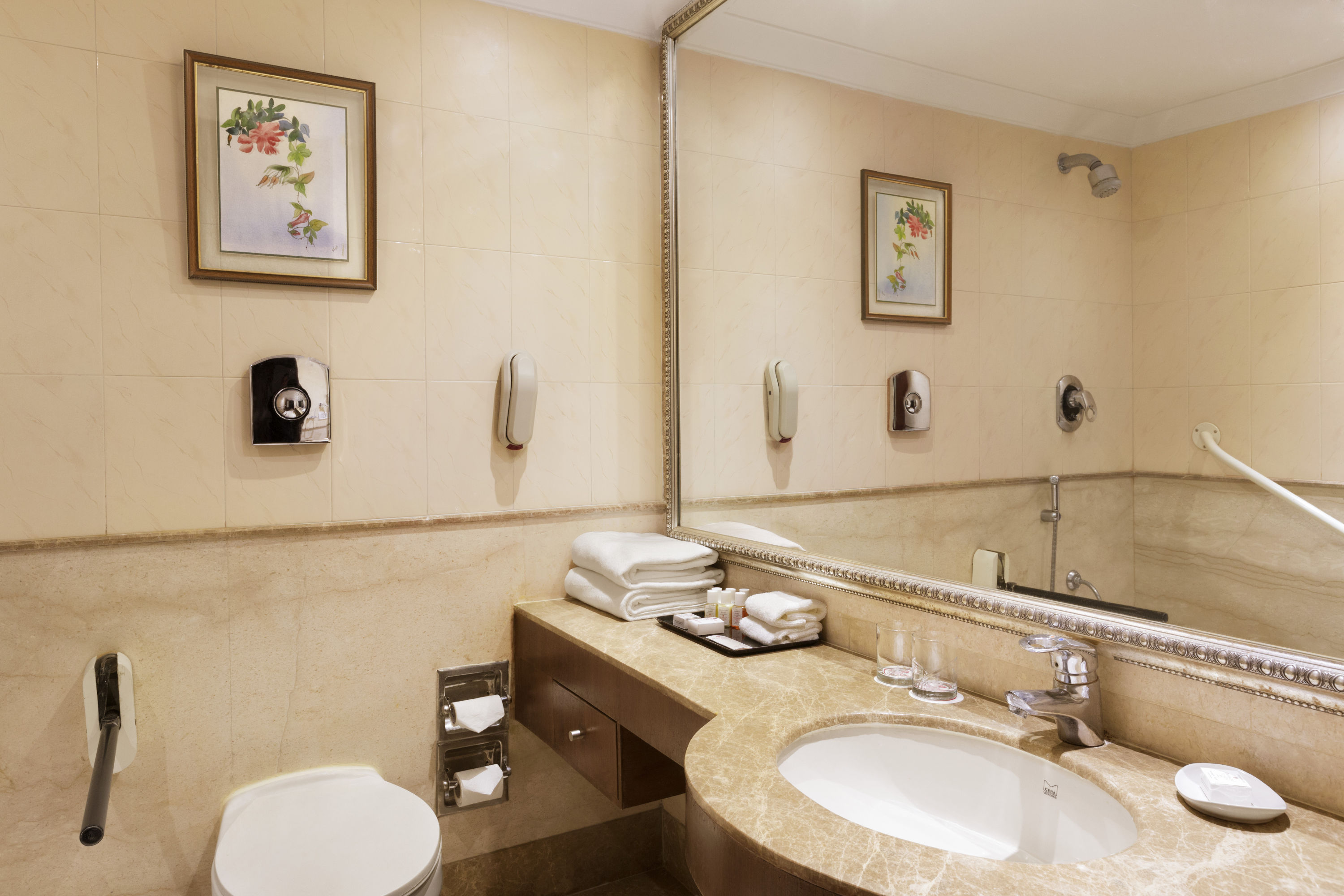 Guest room bath at the Ramada Plaza by Wyndham JHV Varanasi in Varanasi, Other than US/Canada