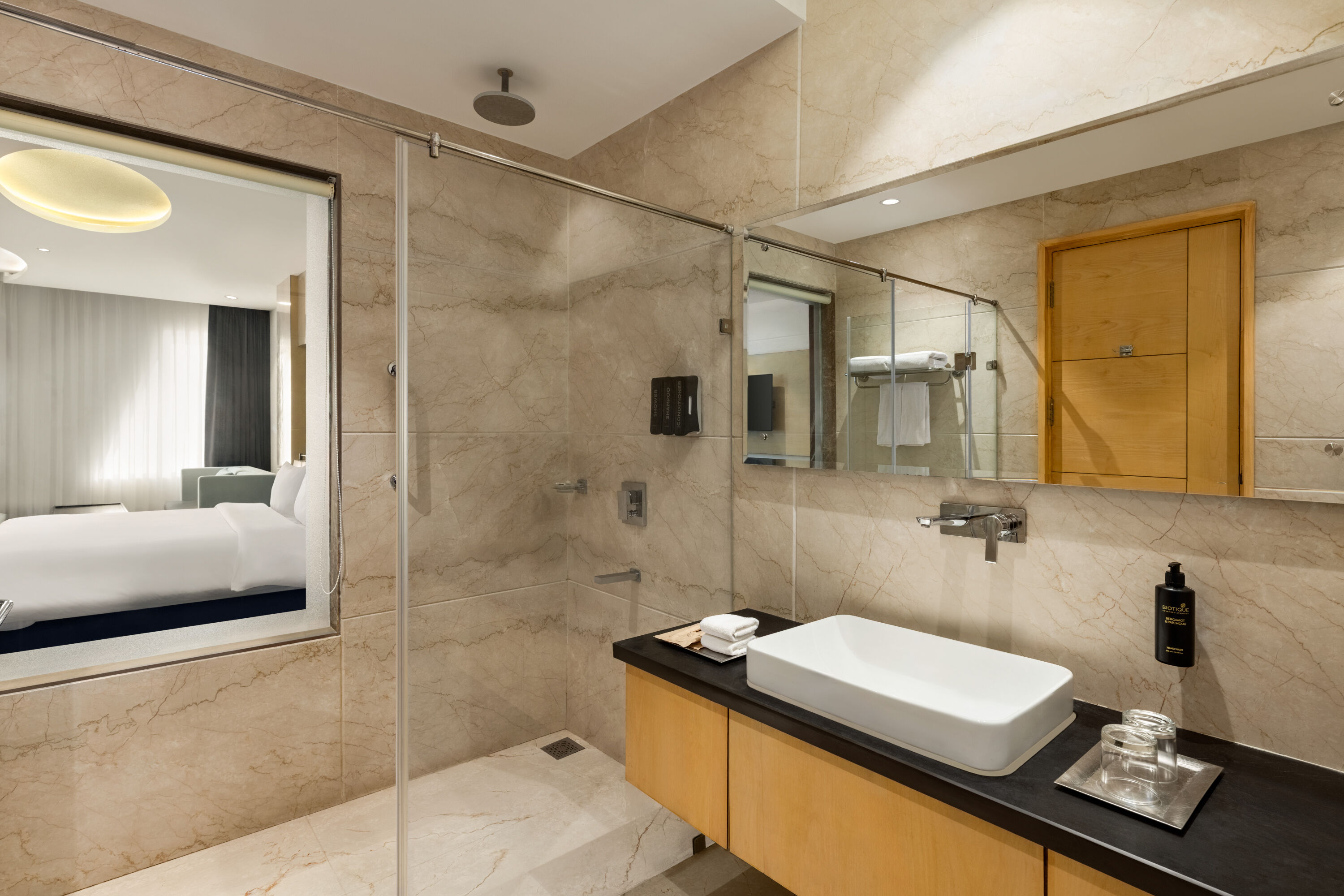 Guest room bath at the Ramada Plaza by Wyndham Jammu Vijaypur in Vijaypur, Other than US/Canada