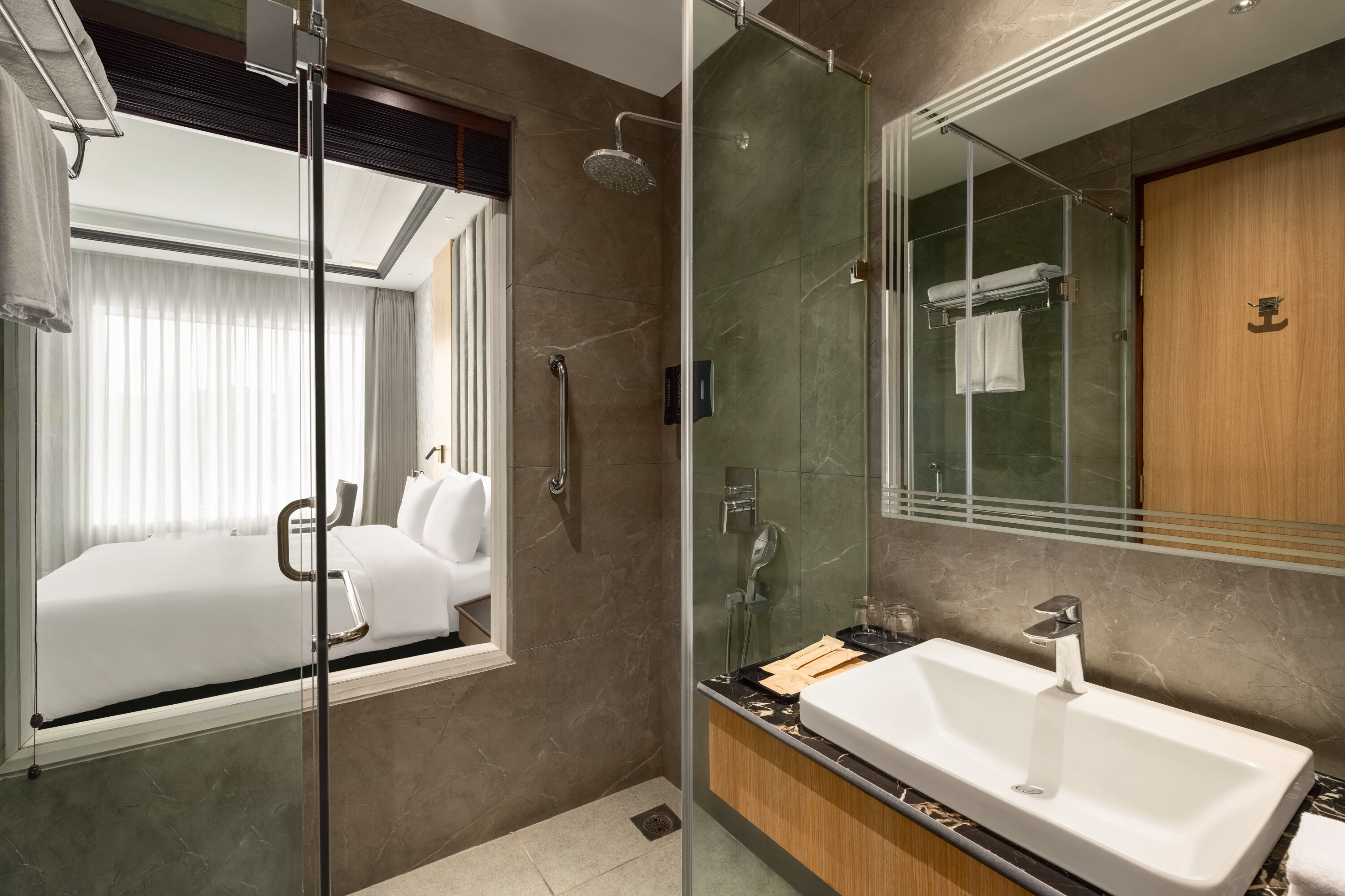 Guest room bath at the Ramada Plaza by Wyndham Jammu Vijaypur in Vijaypur, Other than US/Canada