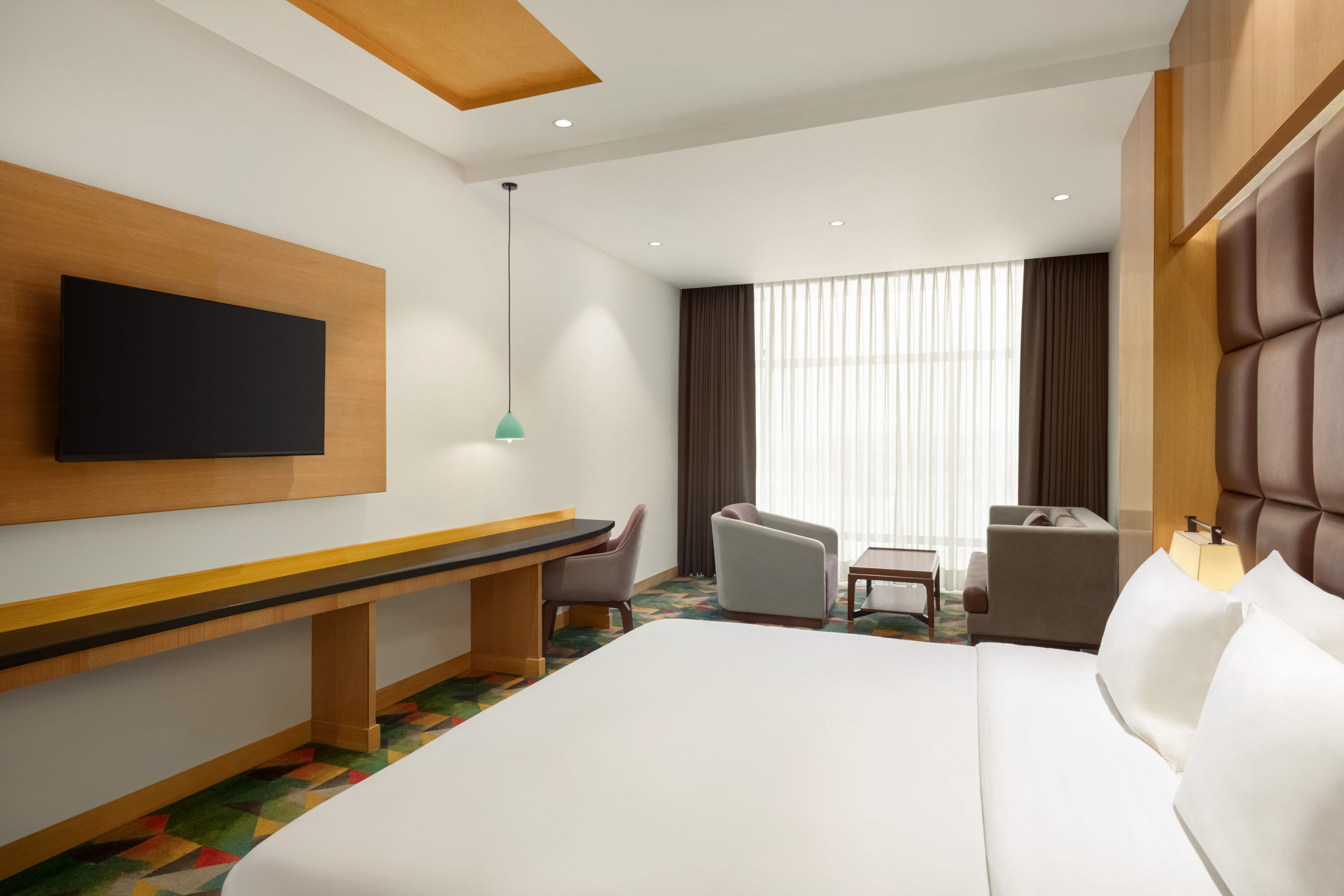 Guest room at the Ramada Plaza by Wyndham Jammu Vijaypur in Vijaypur, Other than US/Canada