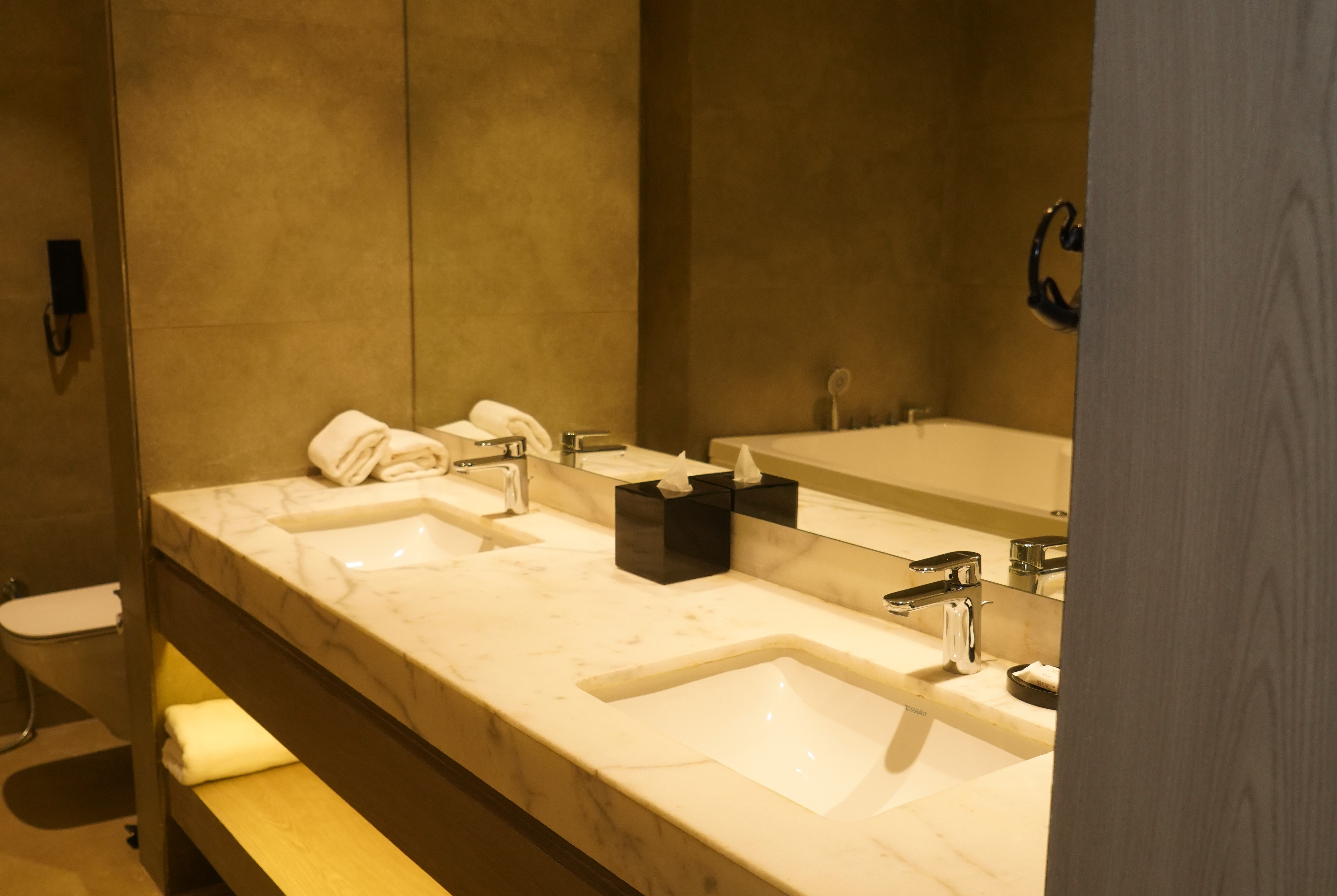 Guest room bath at the Ramada Encore by Wyndham Chandigarh Zirakpur in Zirakpur, Other than US/Canada