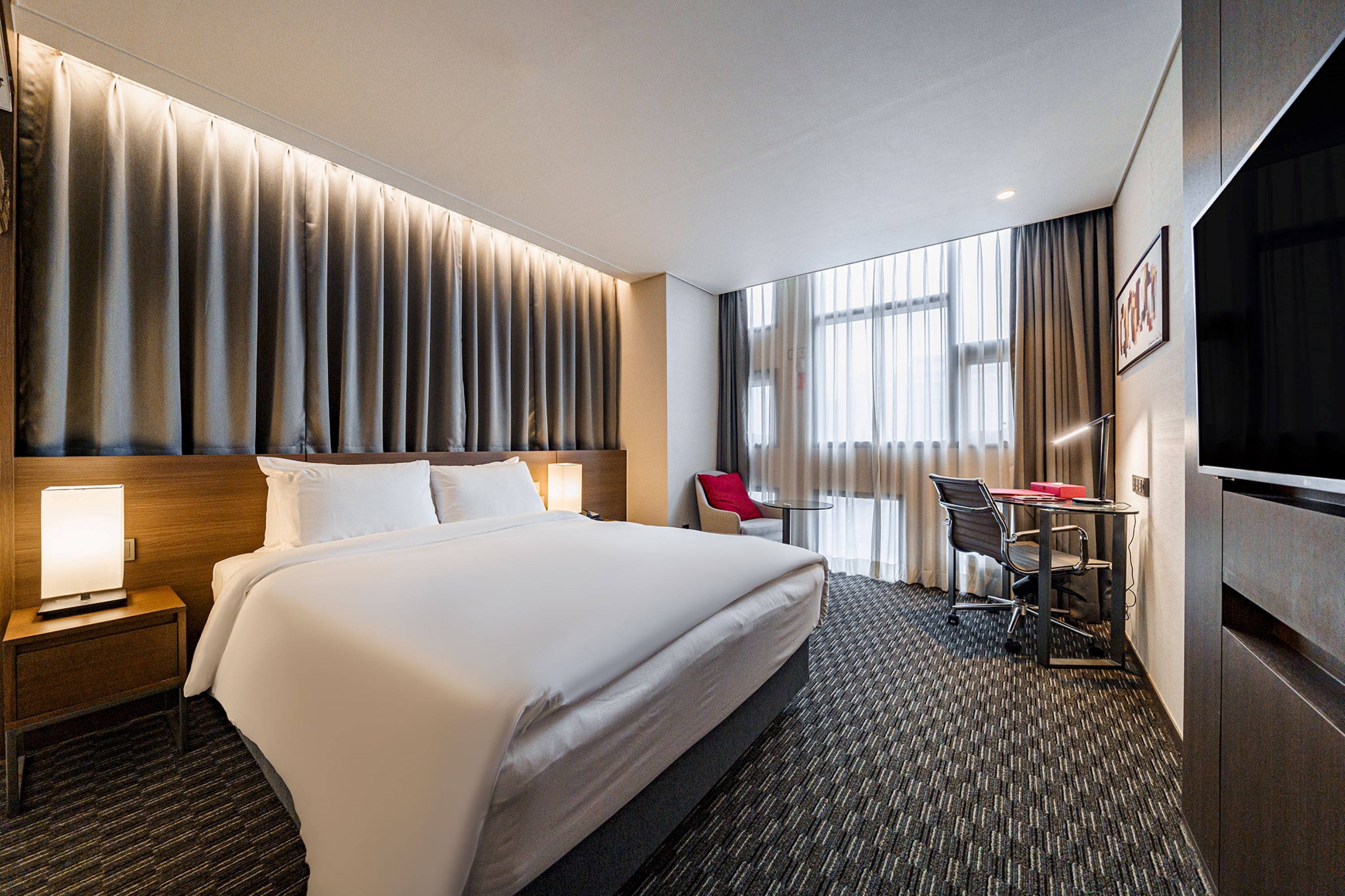 Guest room at the Ramada Encore by Wyndham Busan Station in Busan, Other than US/Canada