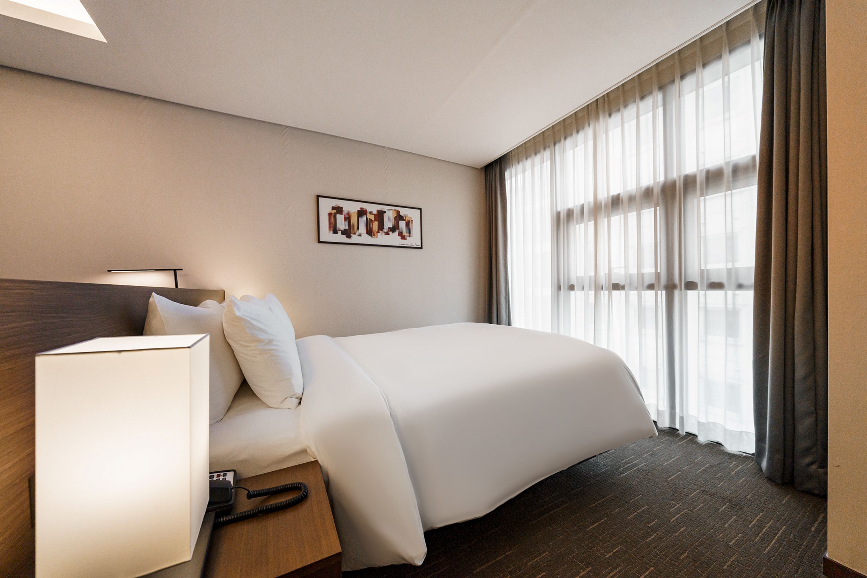 Guest room at the Ramada Encore by Wyndham Busan Station in Busan, Other than US/Canada