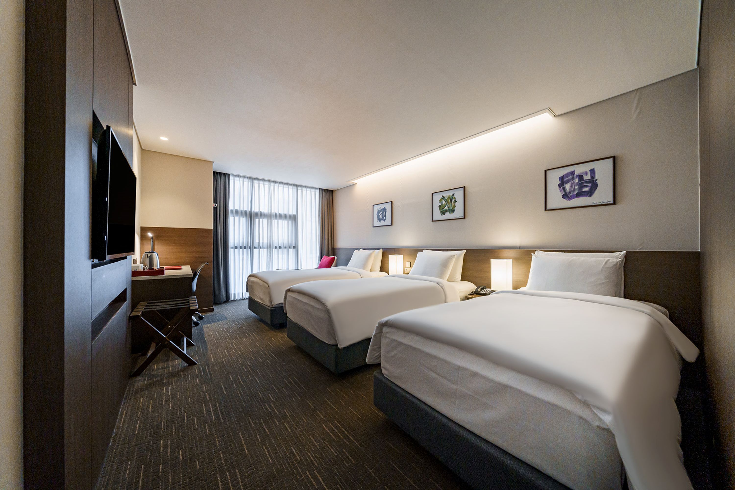 Guest room at the Ramada Encore by Wyndham Busan Station in Busan, Other than US/Canada