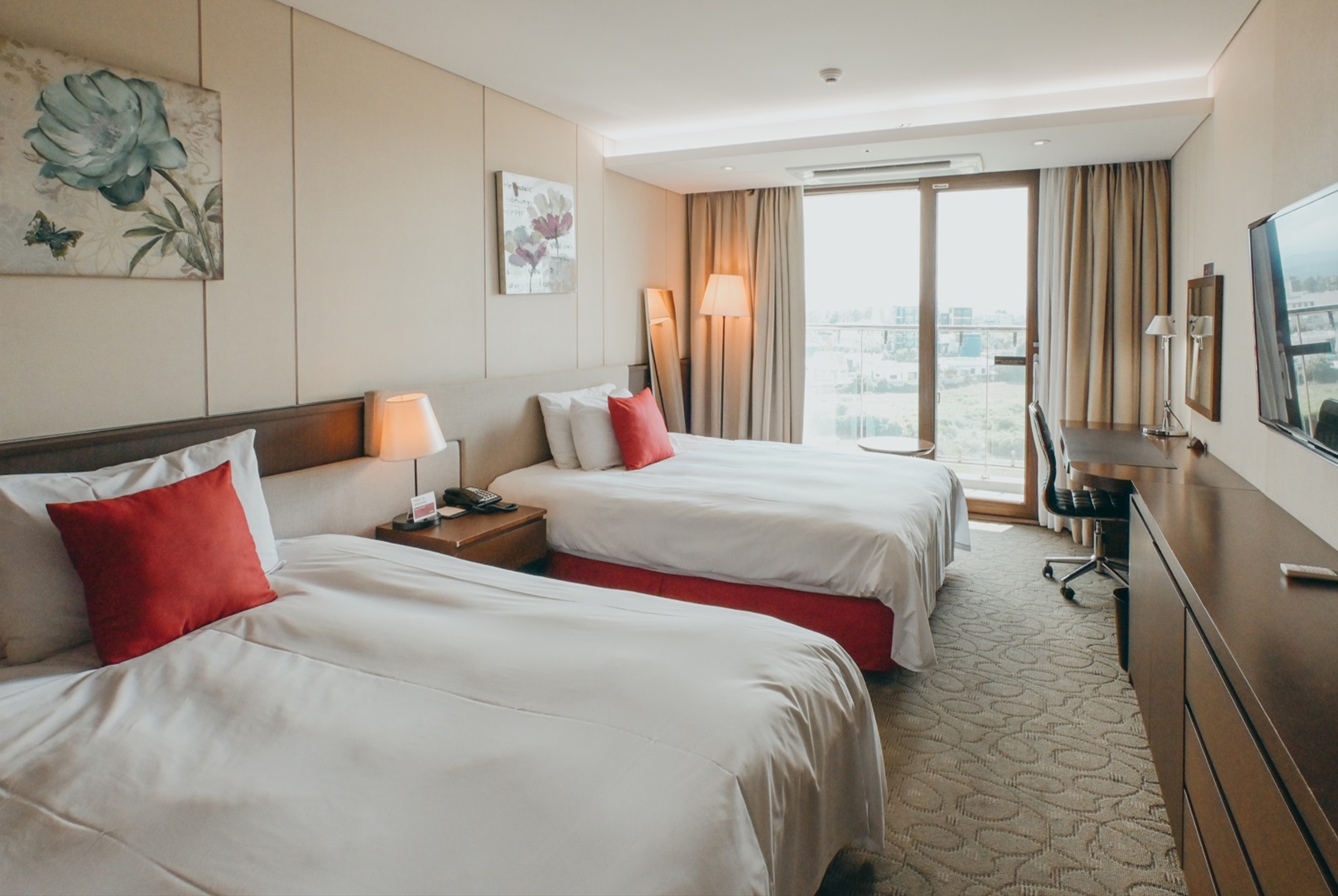 Guest room at the Ramada by Wyndham Jeju Hamdeok in Jeju, Other than US/Canada