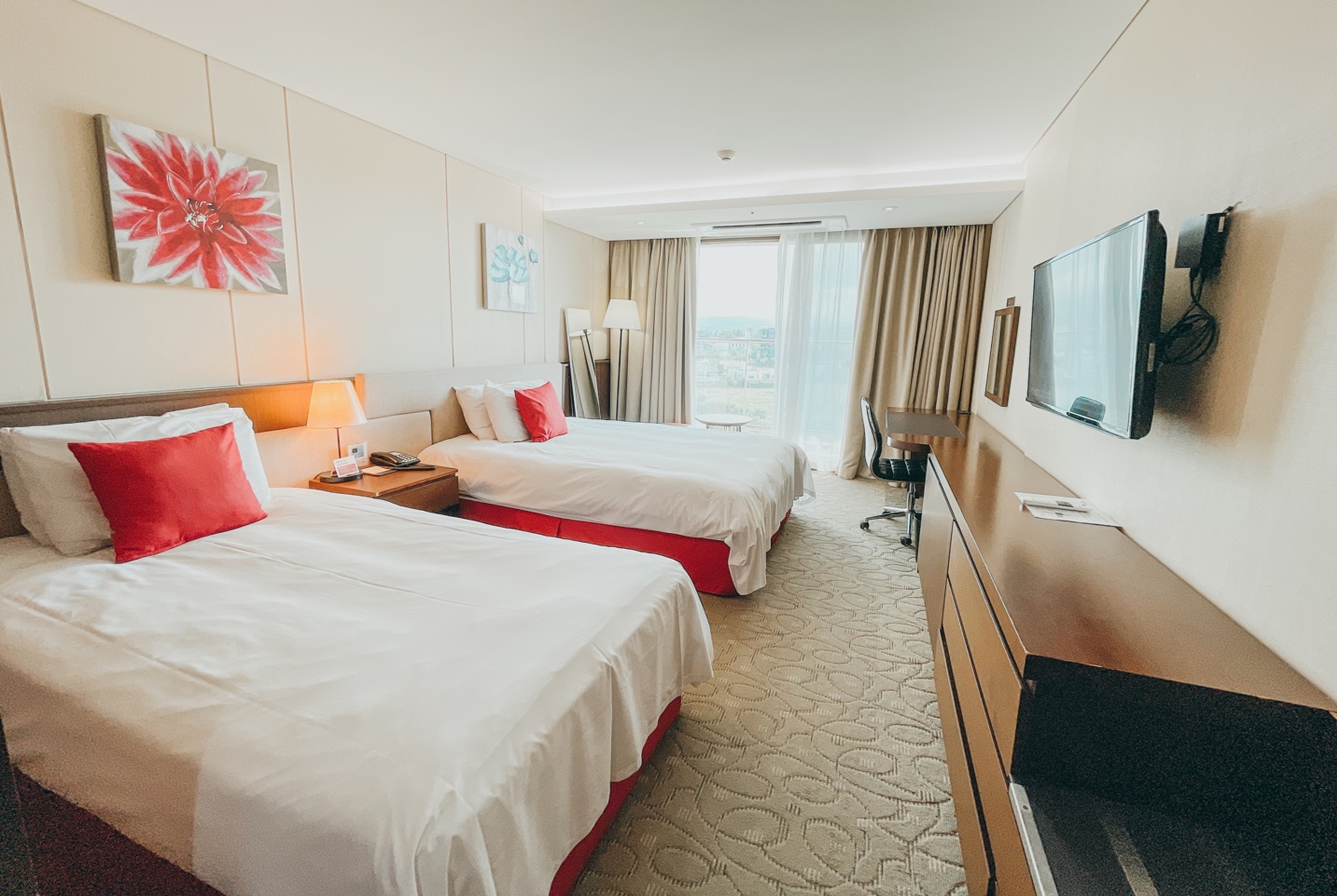 Guest room at the Ramada by Wyndham Jeju Hamdeok in Jeju, Other than US/Canada