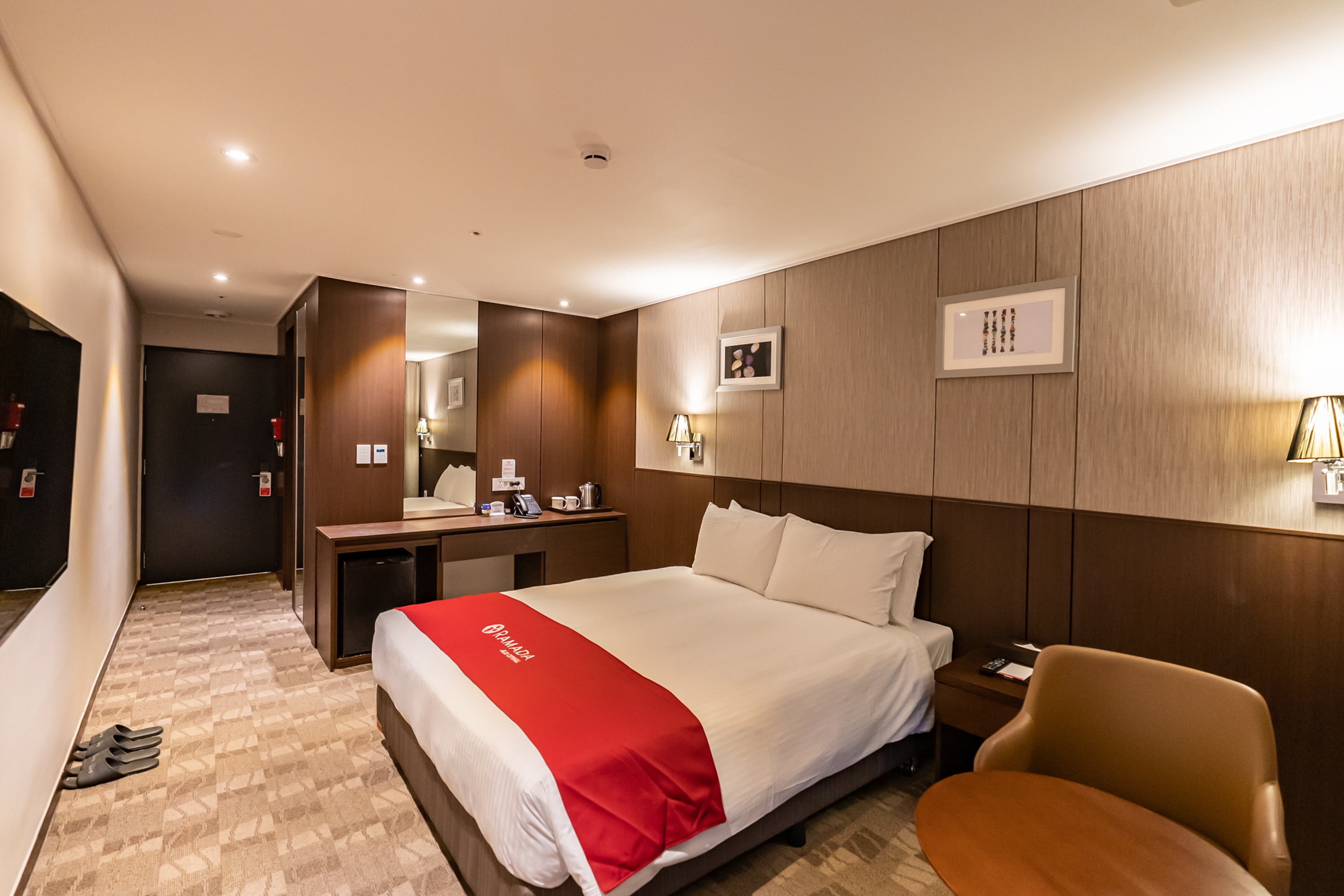 Guest room at the Ramada by Wyndham Jeju City Hall in Jeju, Other than US/Canada