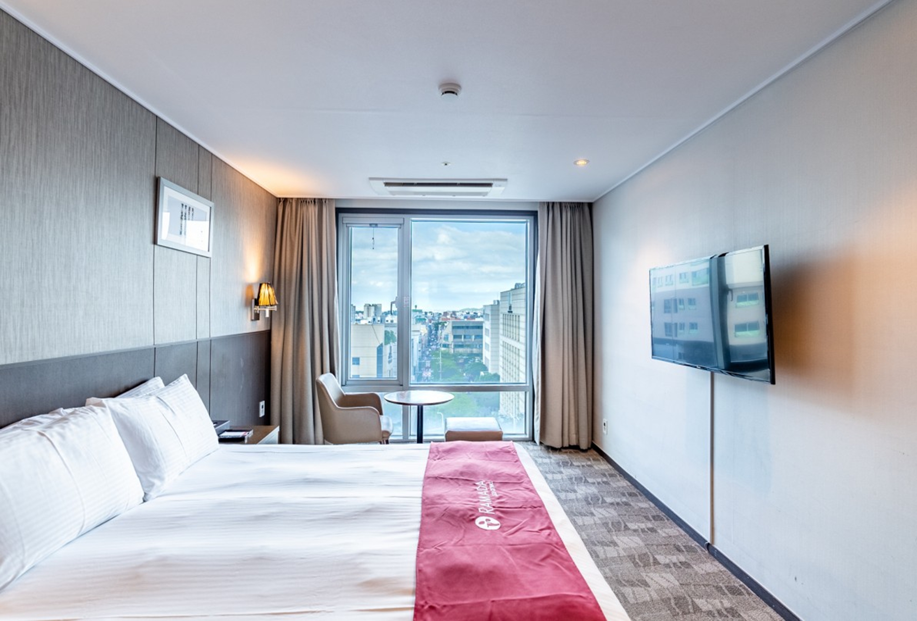 Guest room at the Ramada by Wyndham Jeju City Hall in Jeju, Other than US/Canada