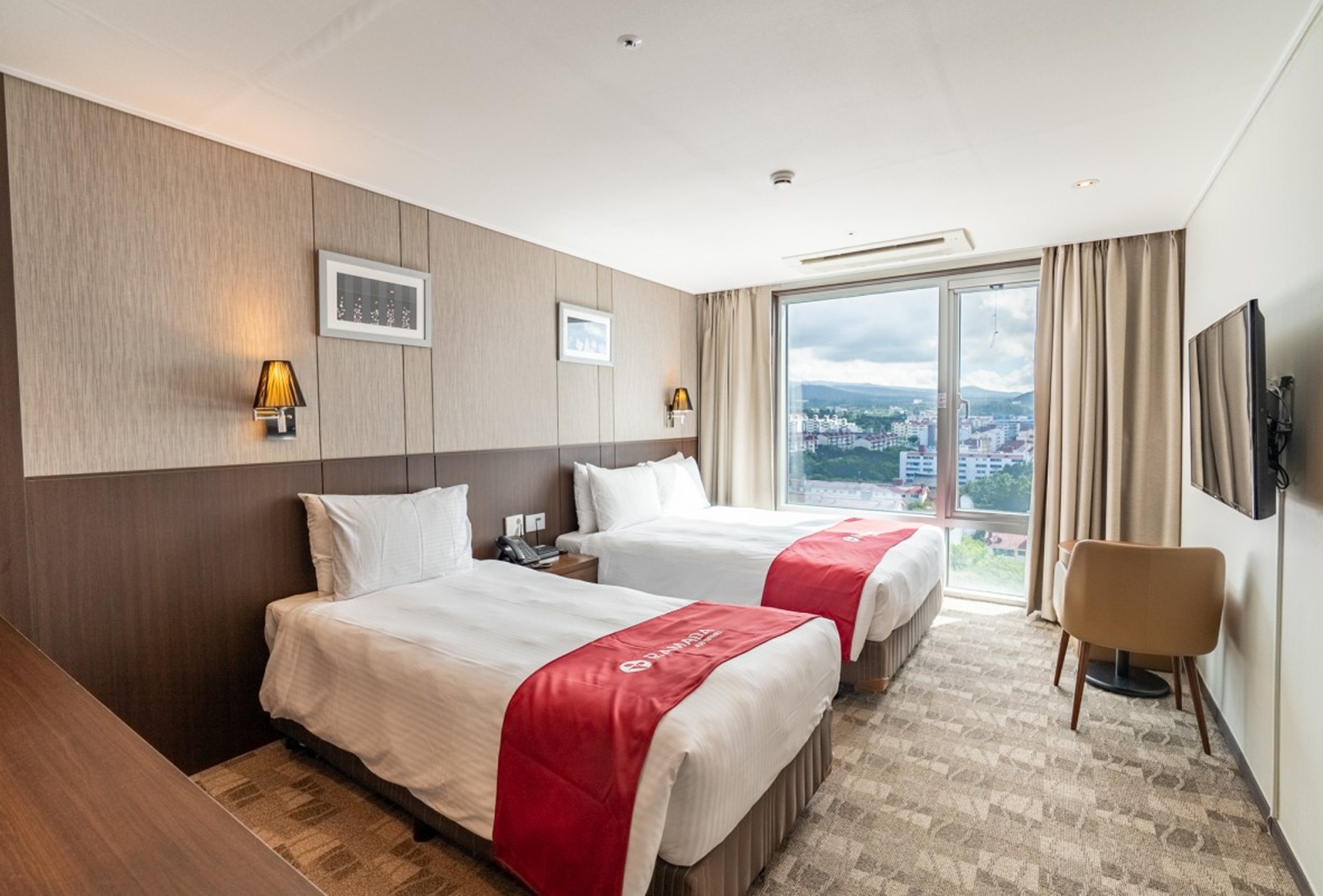 Guest room at the Ramada by Wyndham Jeju City Hall in Jeju, Other than US/Canada