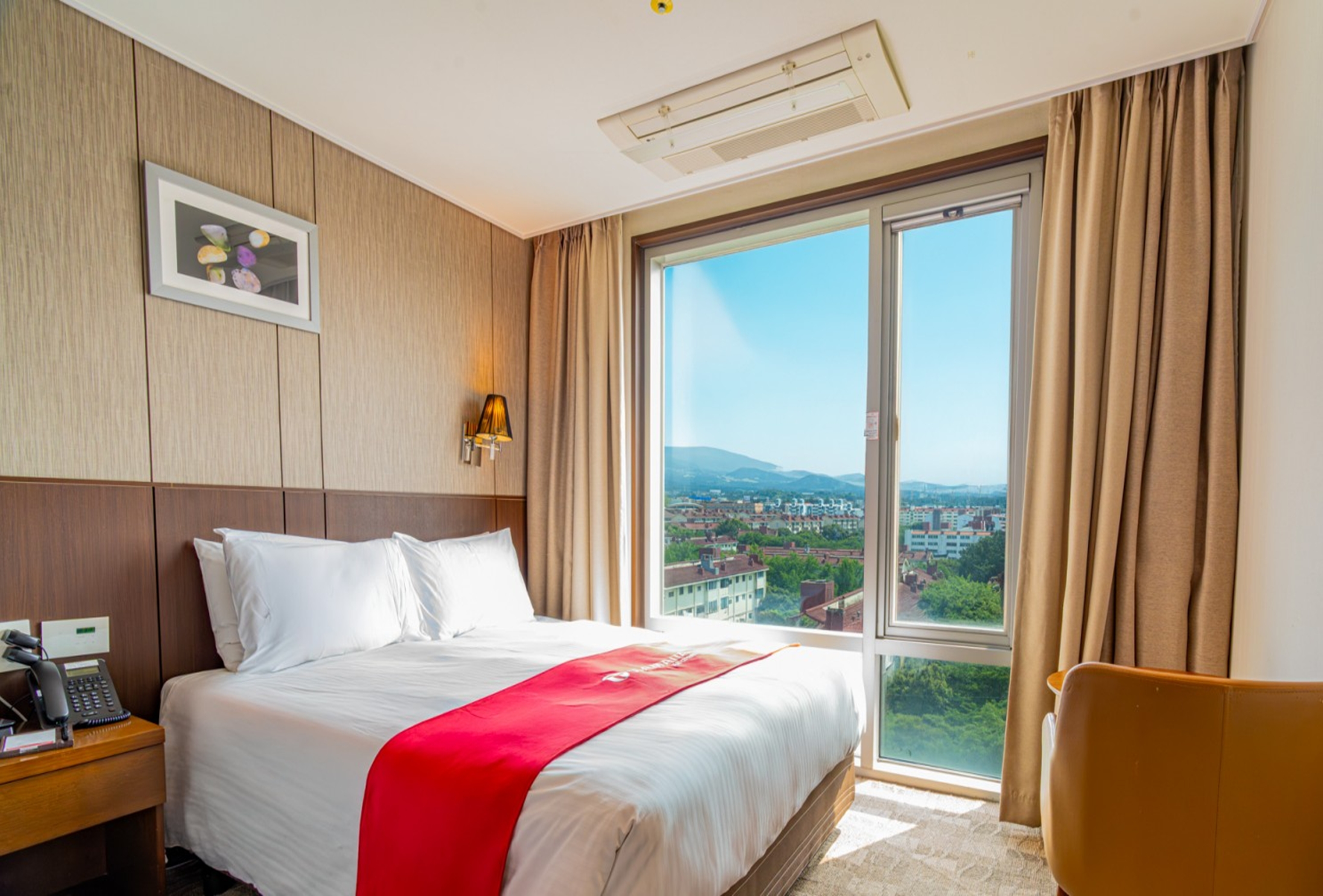 Guest room at the Ramada by Wyndham Jeju City Hall in Jeju, Other than US/Canada