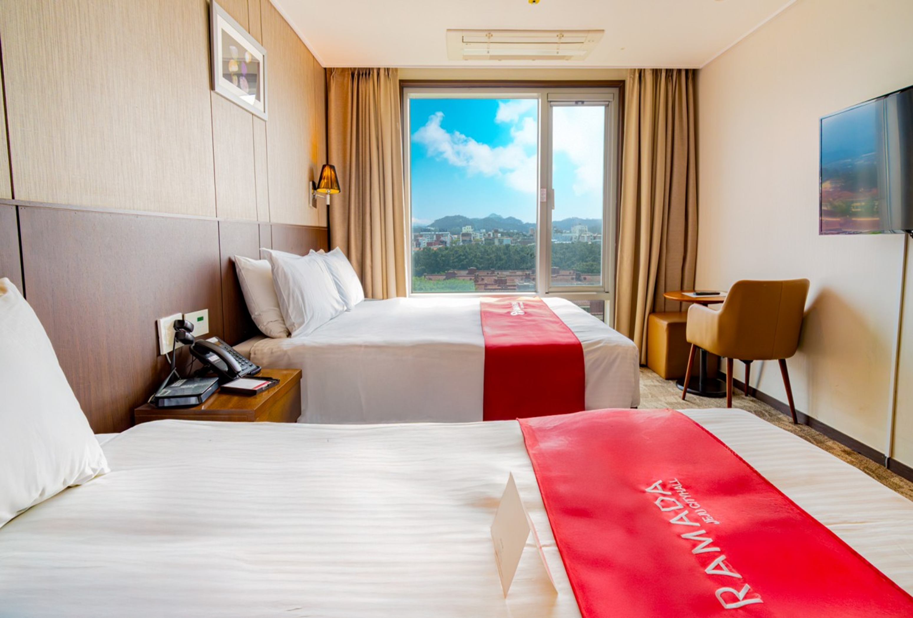 Guest room at the Ramada by Wyndham Jeju City Hall in Jeju, Other than US/Canada