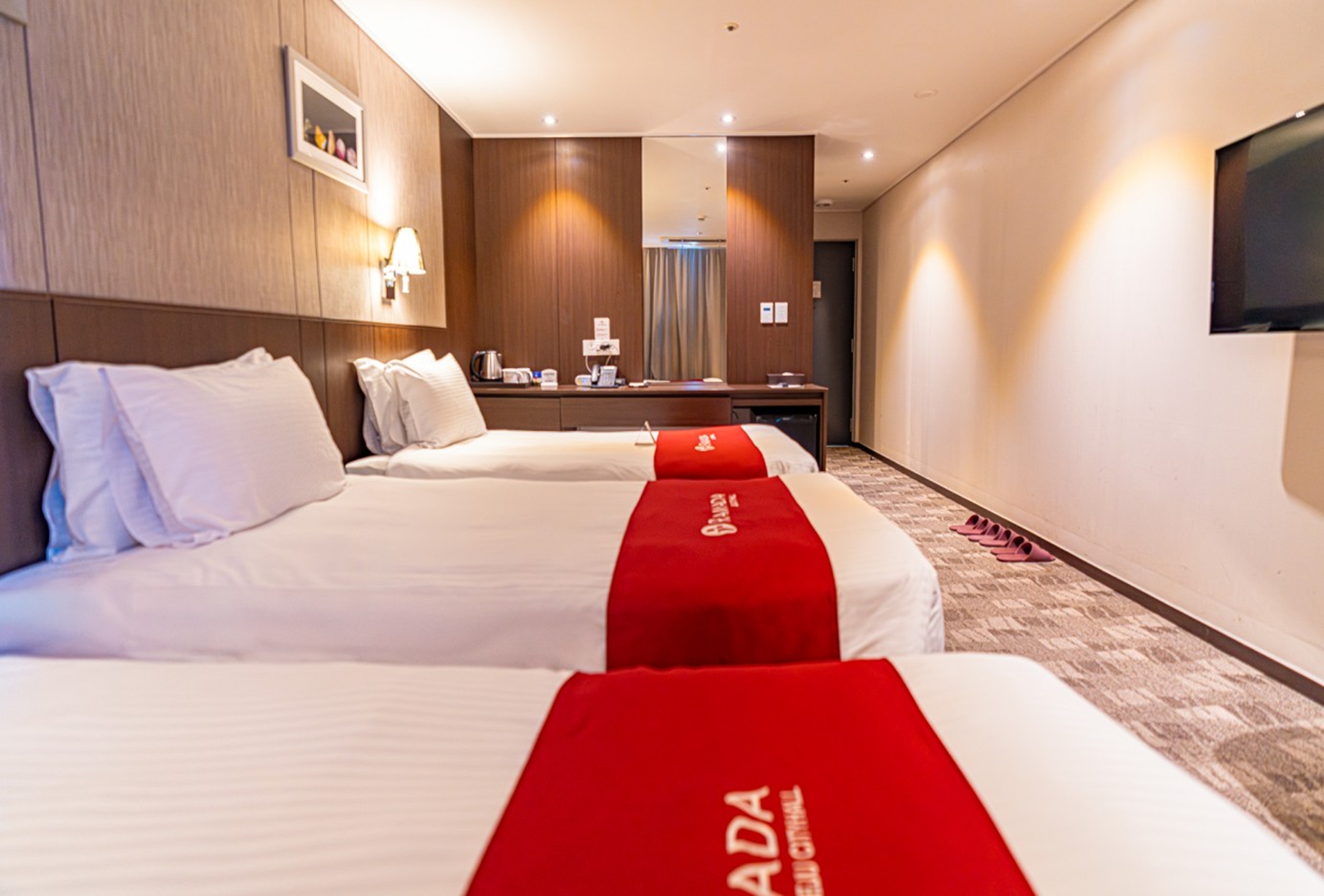 Guest room at the Ramada by Wyndham Jeju City Hall in Jeju, Other than US/Canada