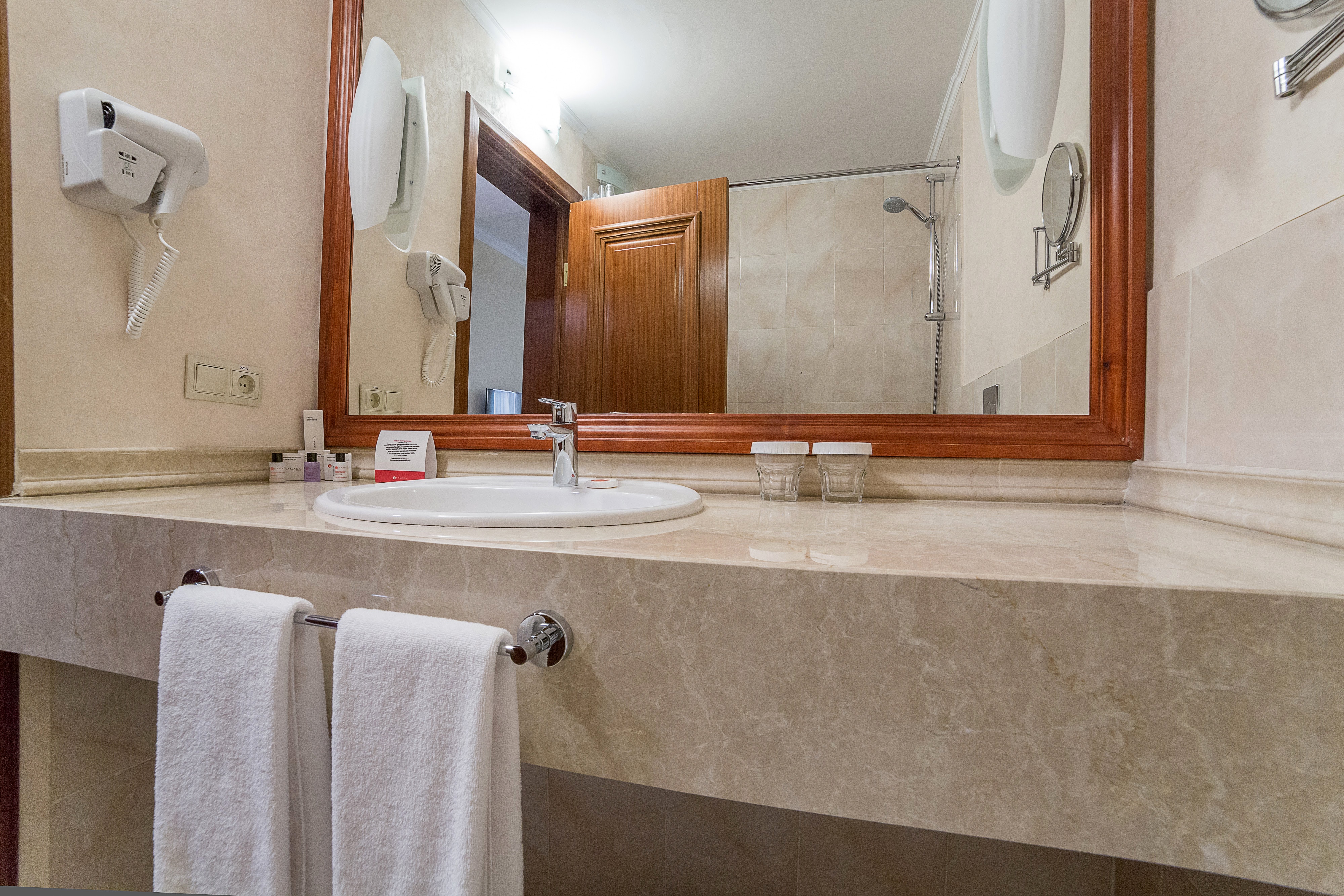 Guest room bath at the Ramada by Wyndham Almaty in Almaty, Other than US/Canada