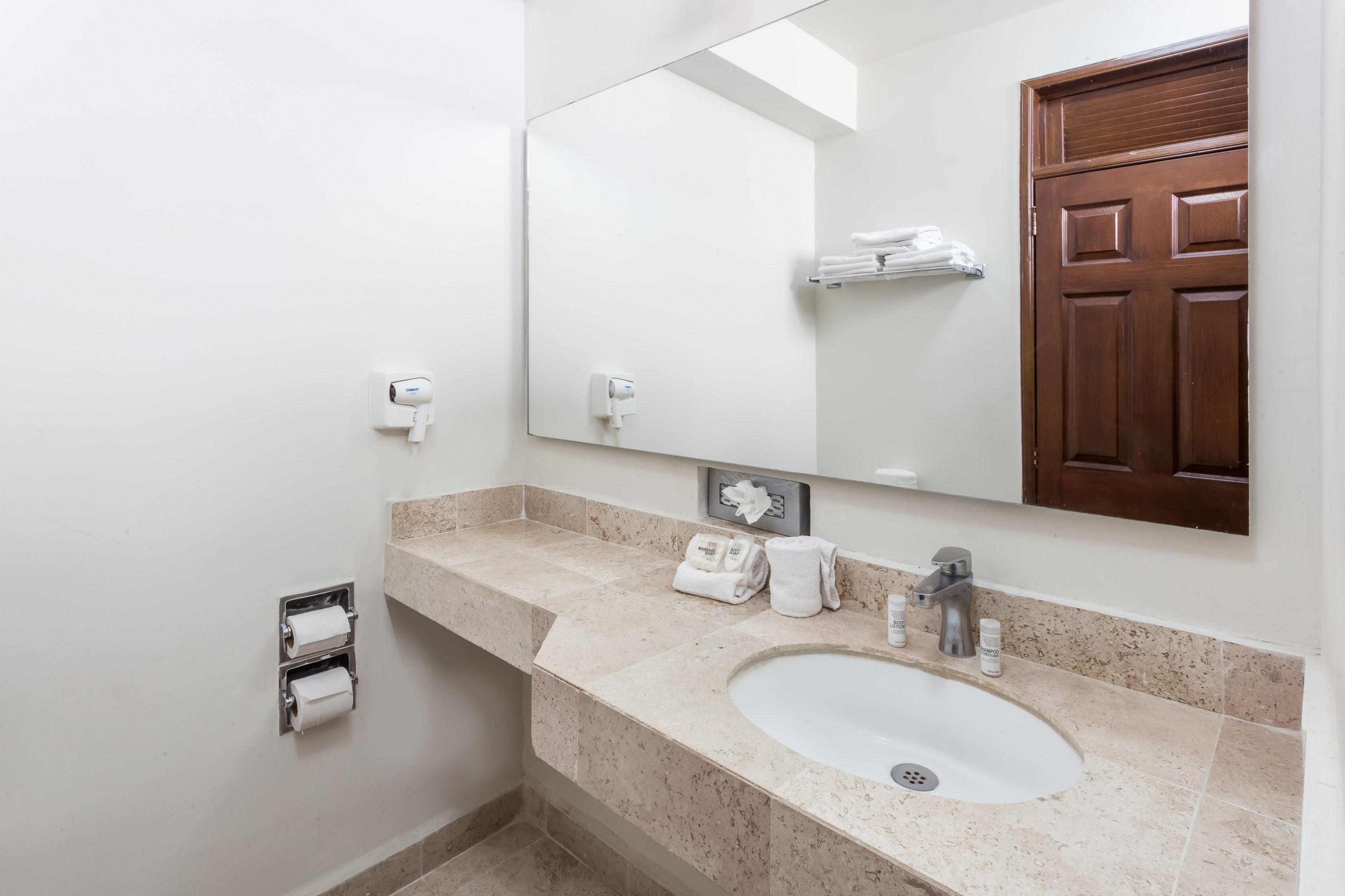 Guest room bath at the Ramada Plaza by Wyndham Leon in Leon, Other than US/Canada