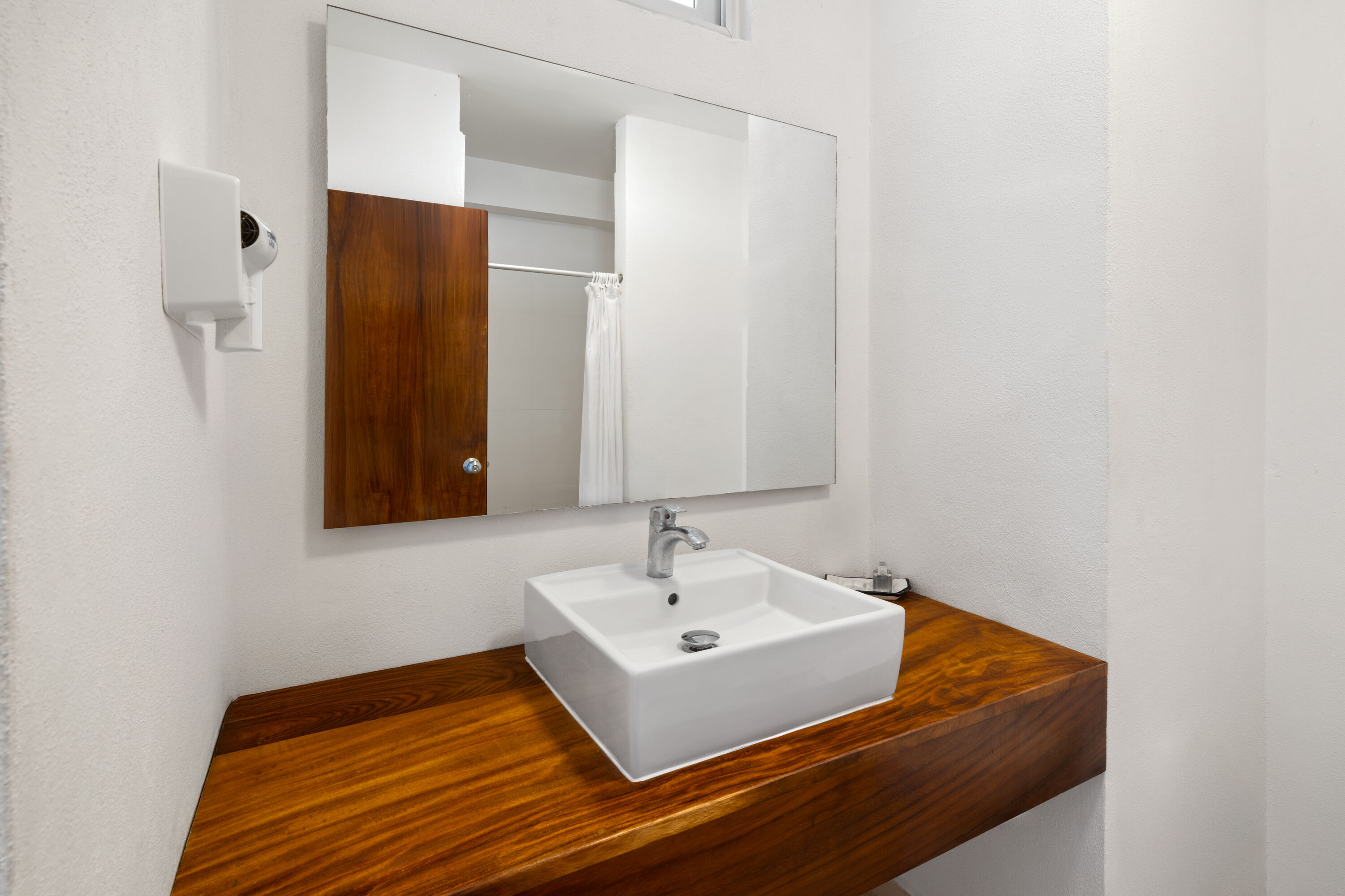 Guest room bath at the Decameron Isla Coral Guayabitos Ramada All Inclusive Resort in Rincon de Guayabitos, Other than US/Canada