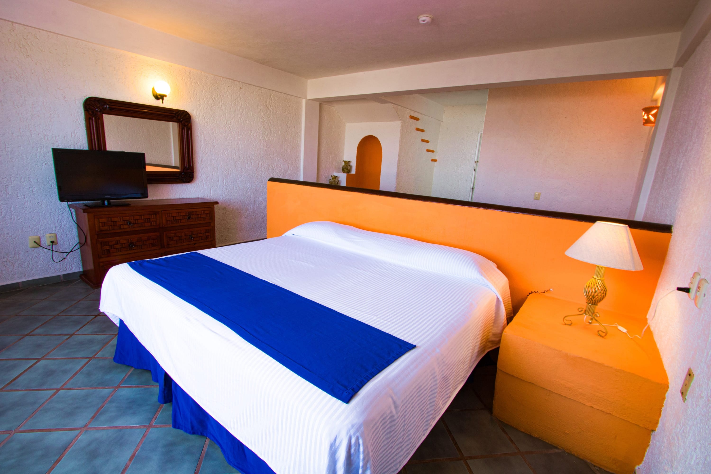Guest room at the Decameron Los Cocos Guayabitos, Ramada All Inclusive Resort in Rincon de Guayabitos, Other than US/Canada